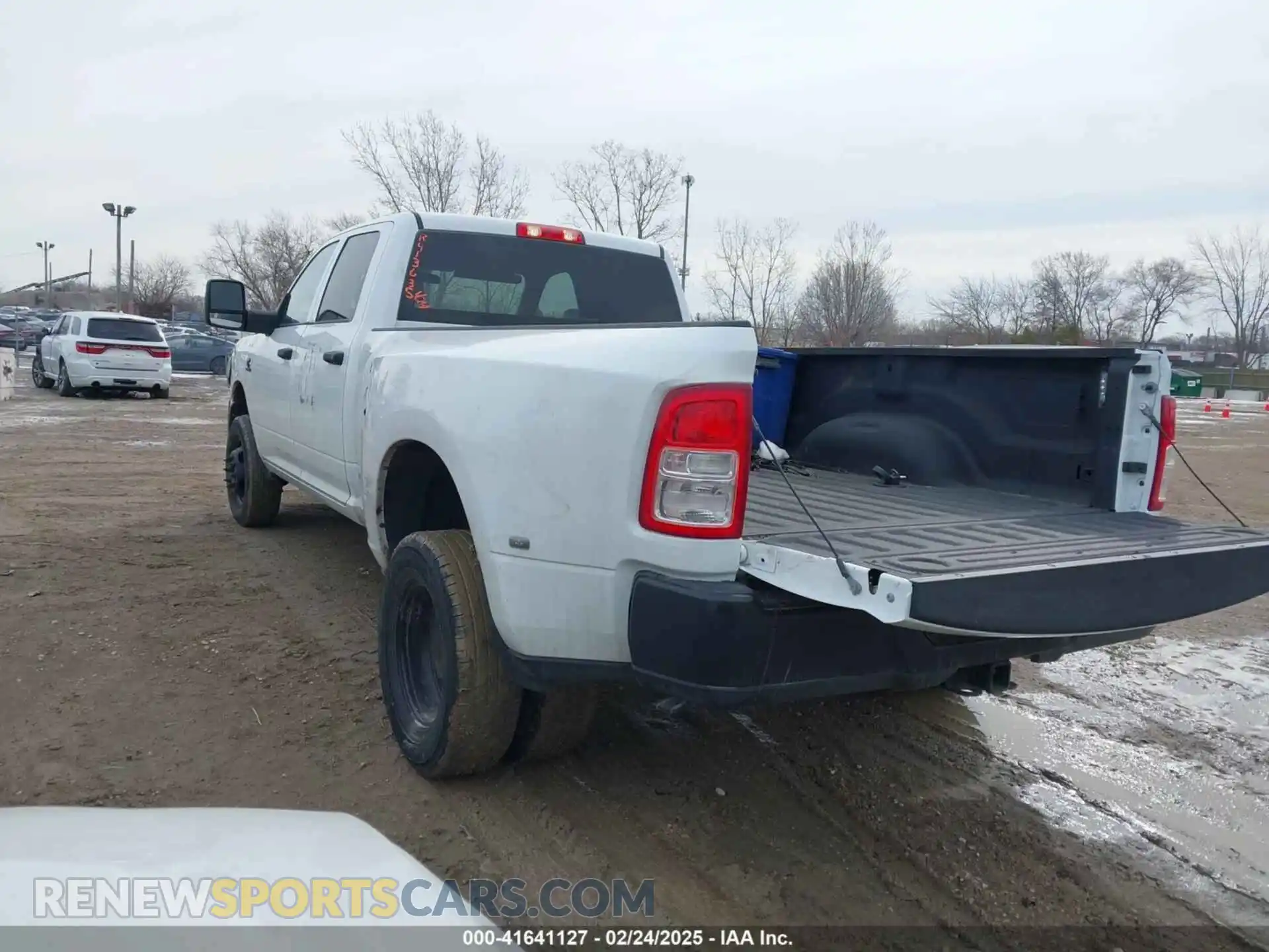 3 Photograph of a damaged car 3C63RRGL8RG112536 RAM 3500 2024