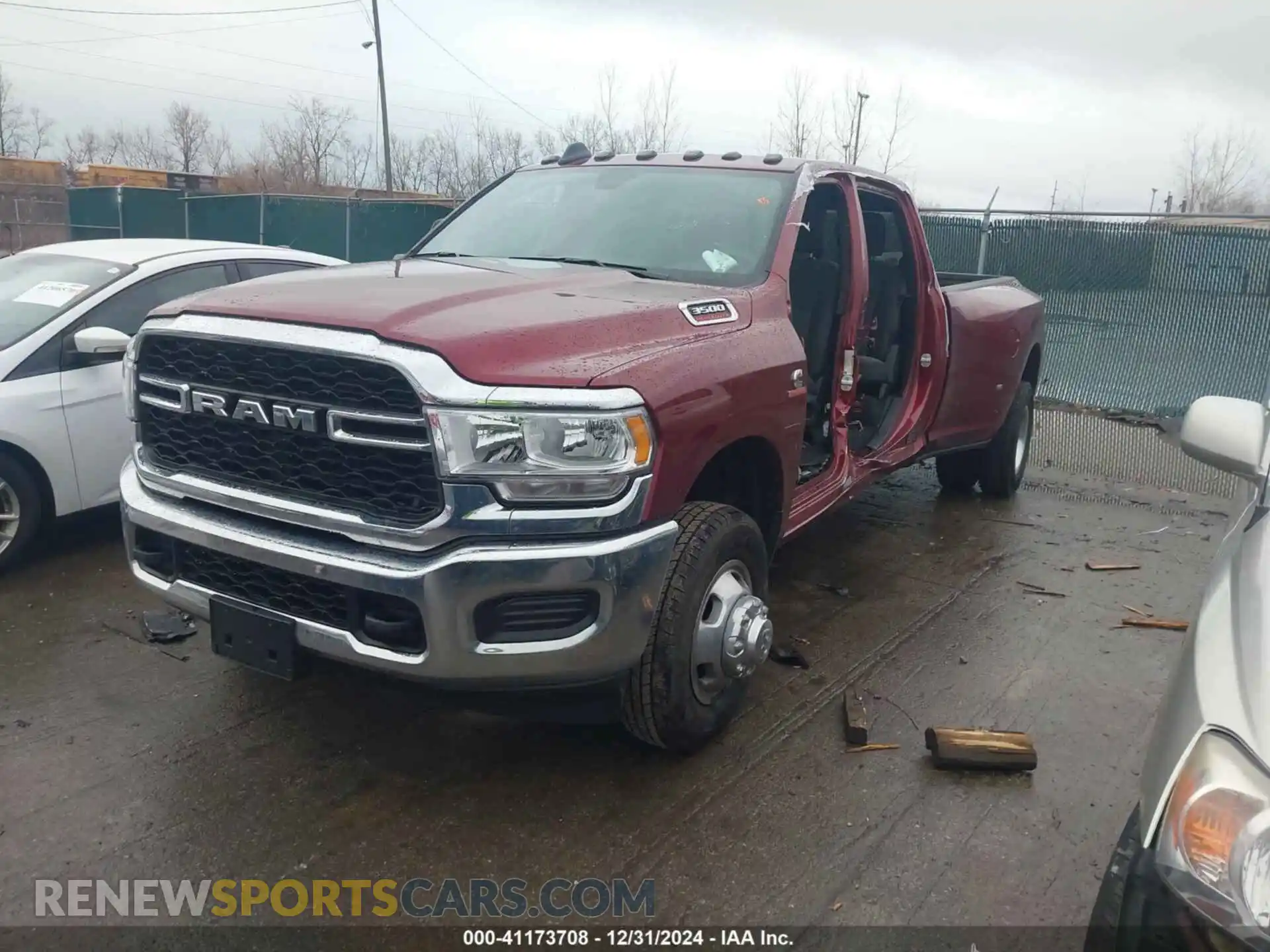 2 Photograph of a damaged car 3C63RRGL9RG295249 RAM 3500 2024
