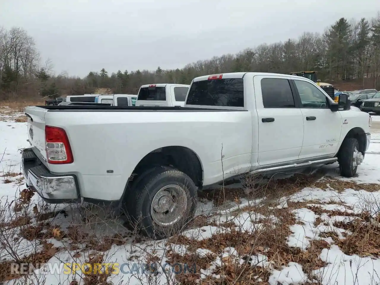 3 Photograph of a damaged car 3C63RRHL1RG241216 RAM 3500 2024