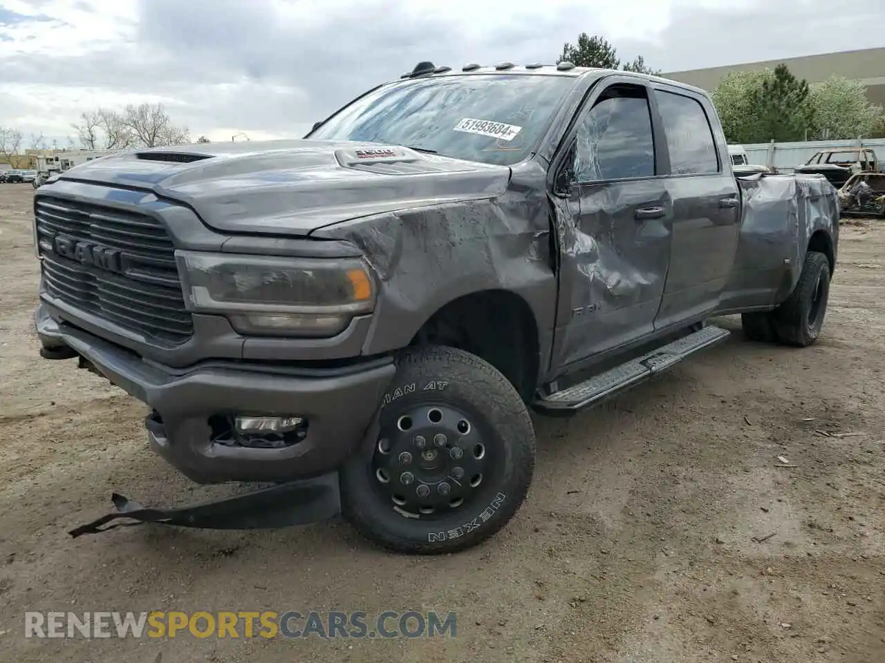 1 Photograph of a damaged car 3C63RRJL3RG150085 RAM 3500 2024