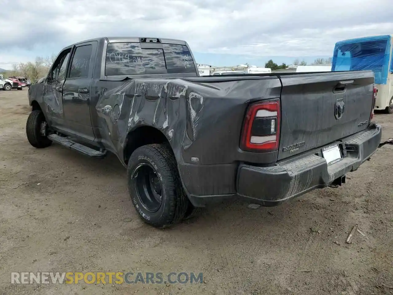 2 Photograph of a damaged car 3C63RRJL3RG150085 RAM 3500 2024