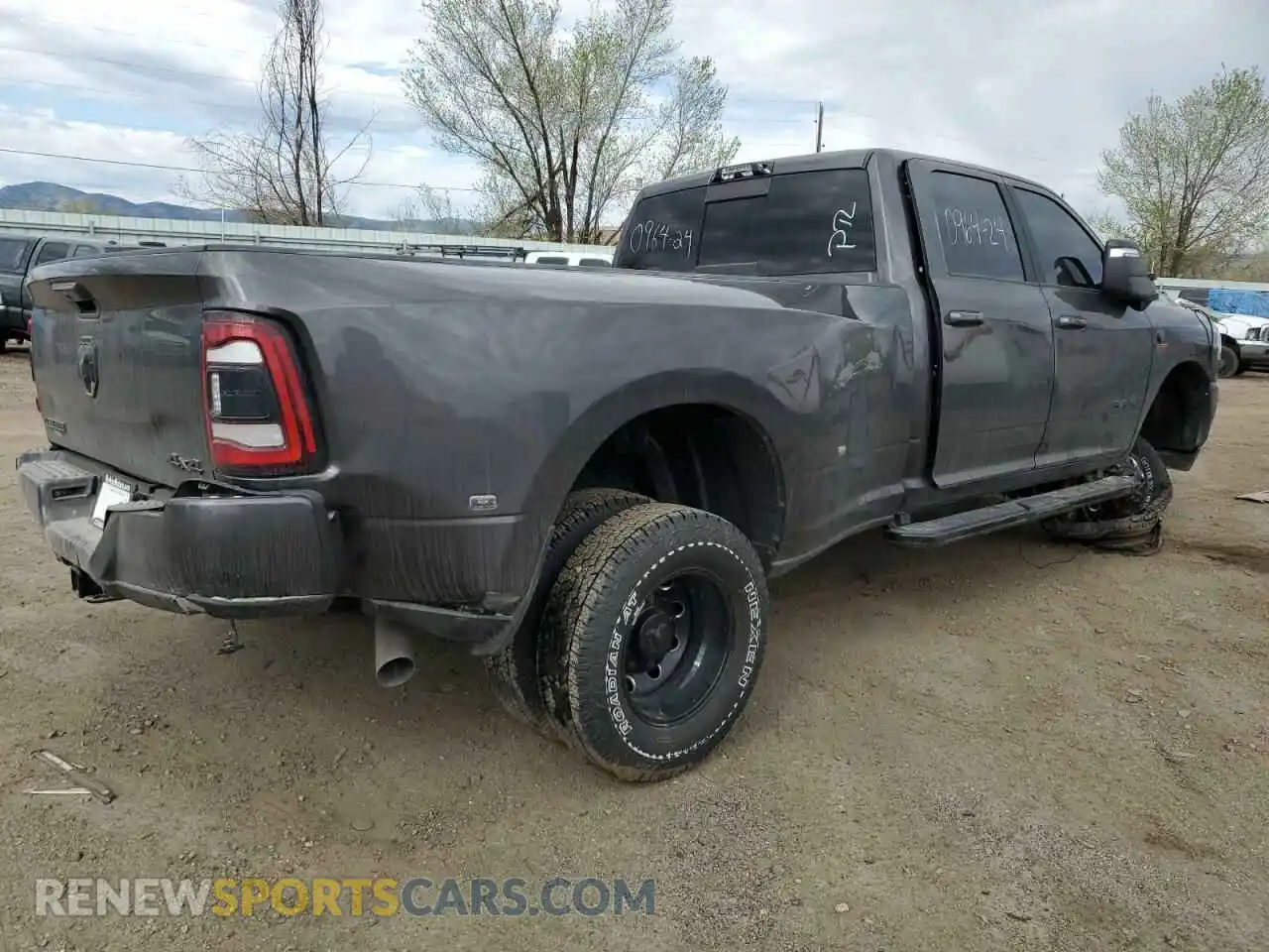 3 Photograph of a damaged car 3C63RRJL3RG150085 RAM 3500 2024