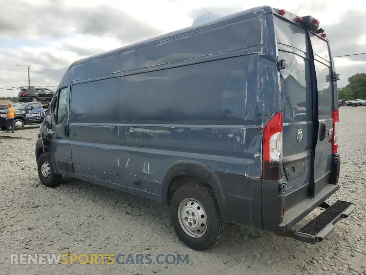 2 Photograph of a damaged car 3C6TRVDG5KE514838 RAM All Models 2019