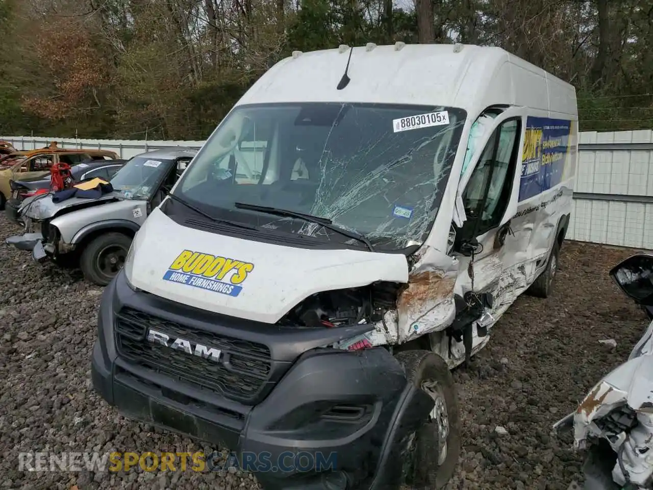 1 Photograph of a damaged car 3C6LRVDG3PE558604 RAM All Models 2023