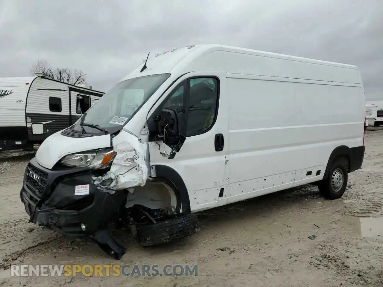 1 Photograph of a damaged car 3C6LRVDG5RE105345 RAM All Models 2024
