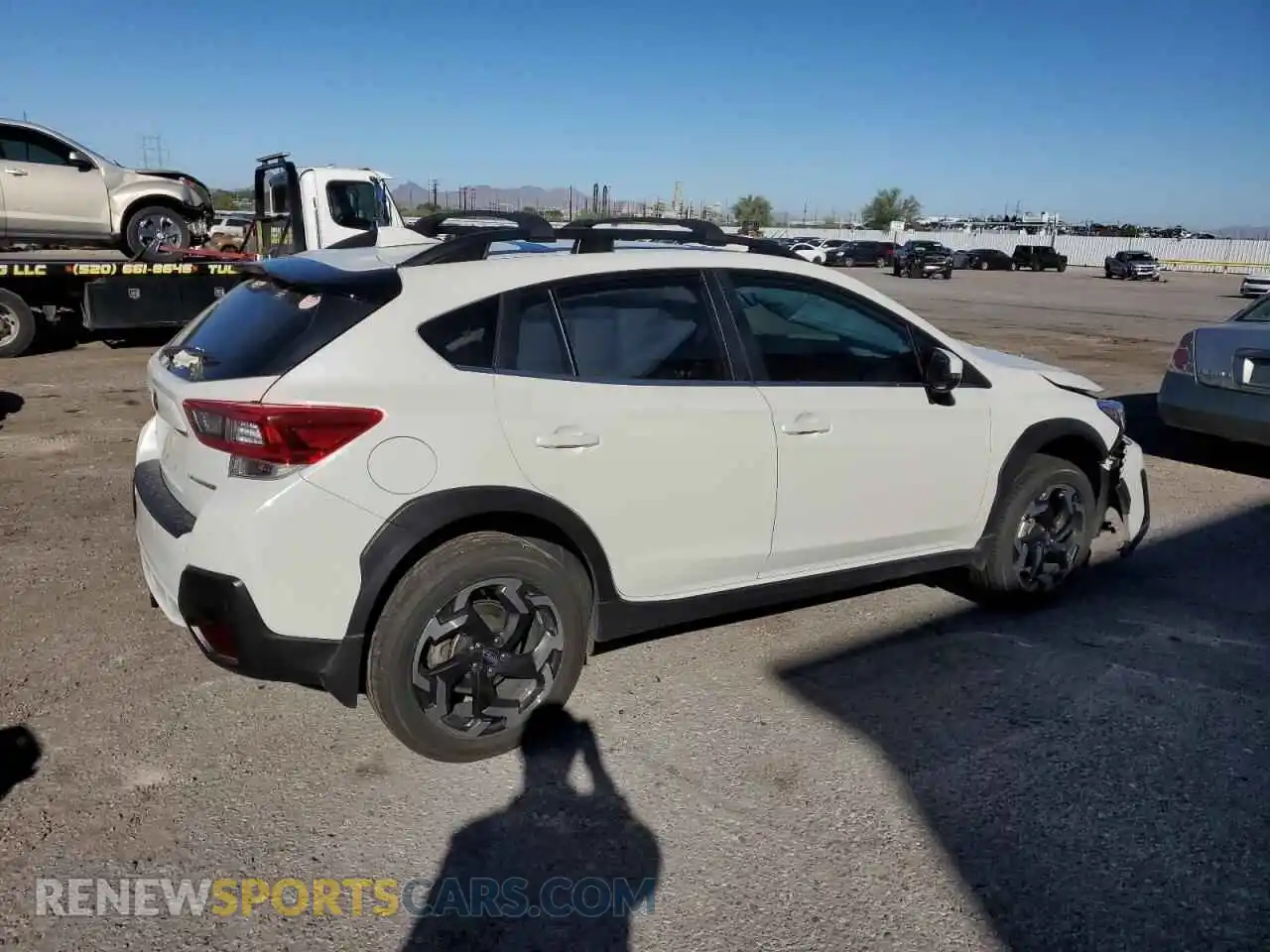 3 Фотография поврежденного автомобиля JF2GTHMC1P8249011 SUBARU CROSSTREK 2023