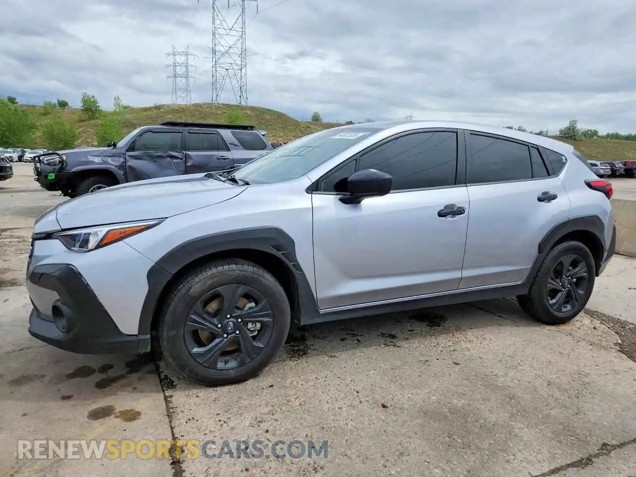 1 Photograph of a damaged car JF2GUABC1R8396357 SUBARU CROSSTREK 2024