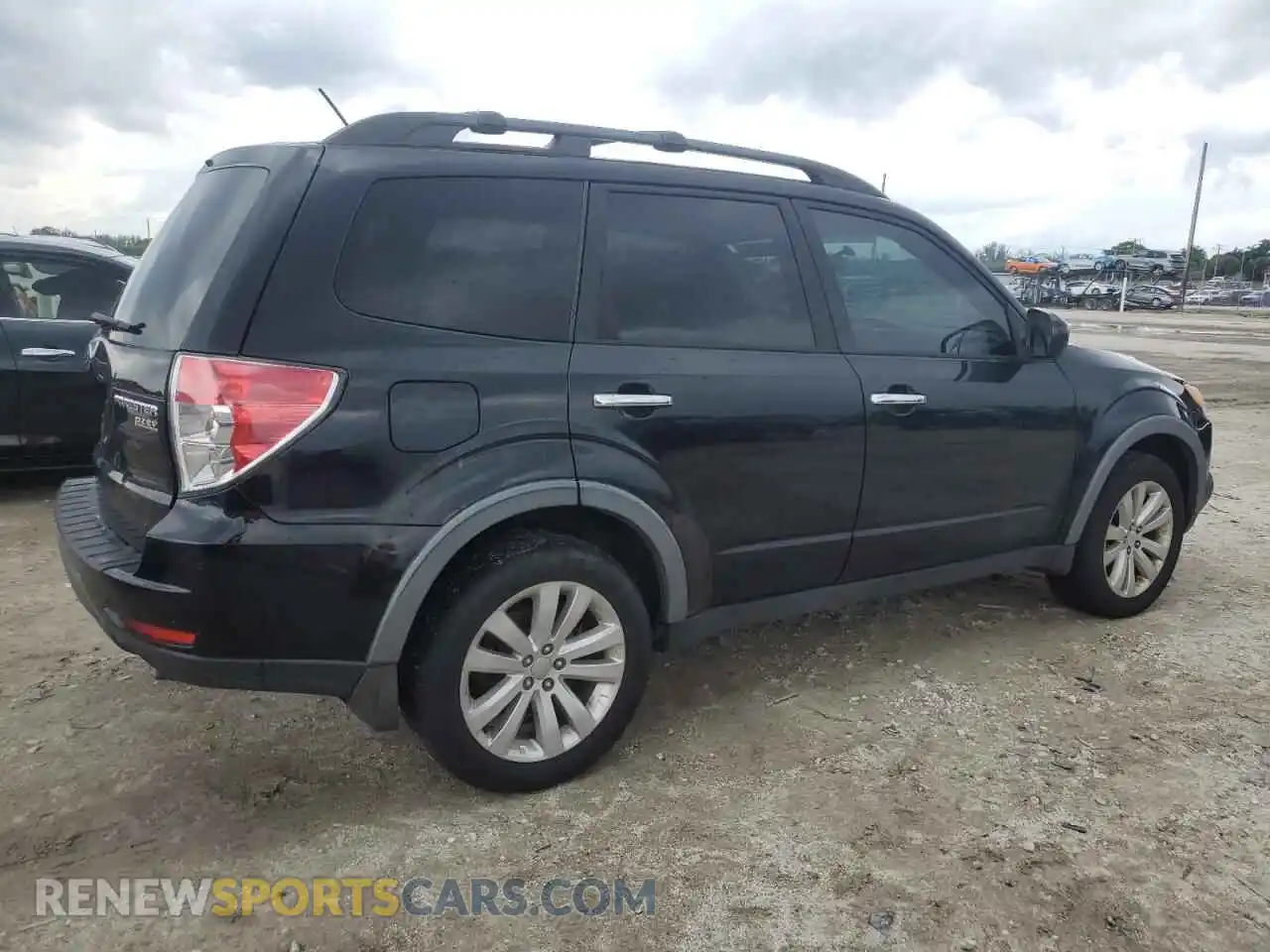 3 fotografías del automóvil dañado JF2SHADC0BH770488 SUBARU FORESTER 2026