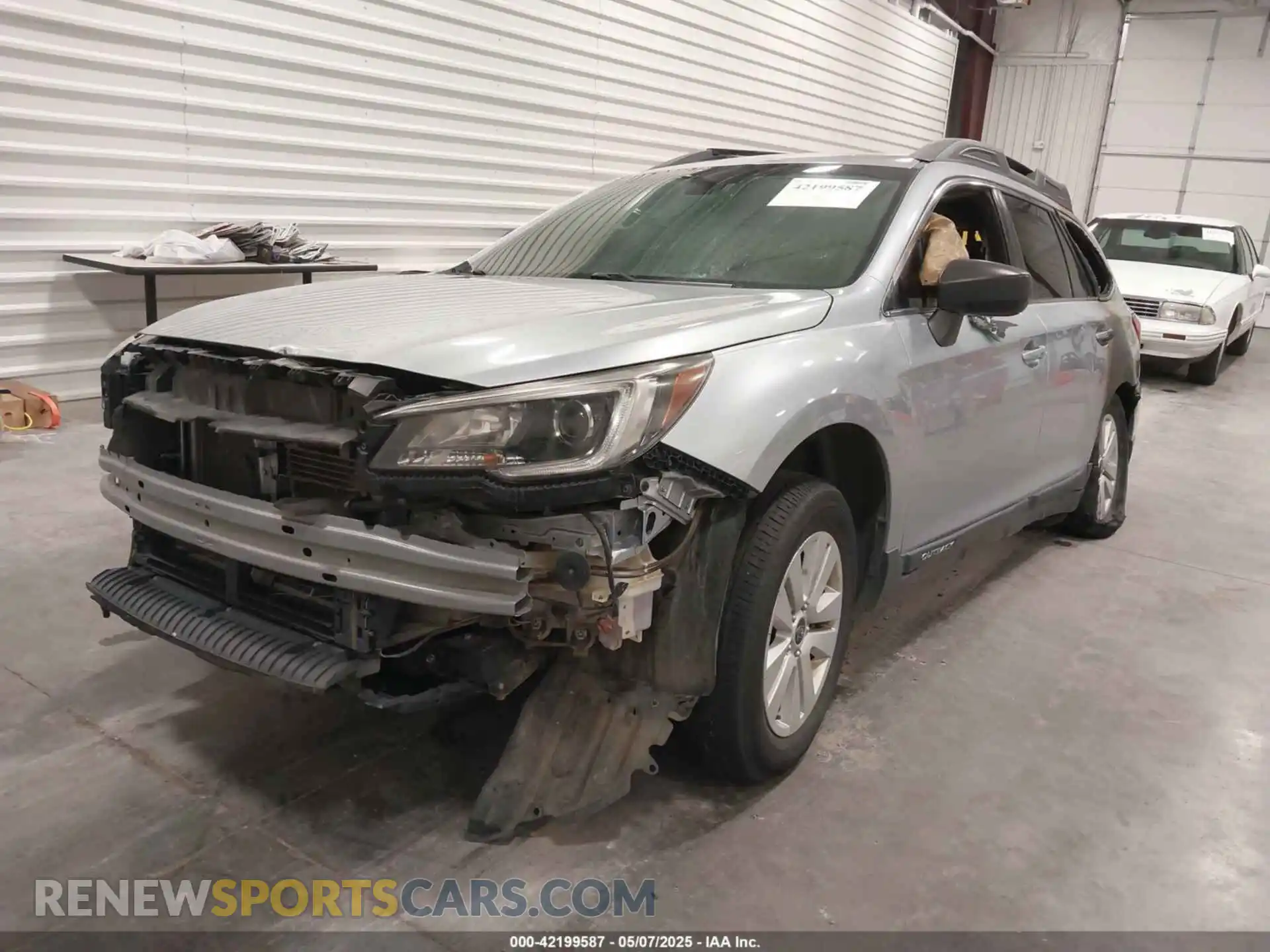 2 Photograph of a damaged car 4S4BSABC1K3309585 SUBARU OUTBACK 2019