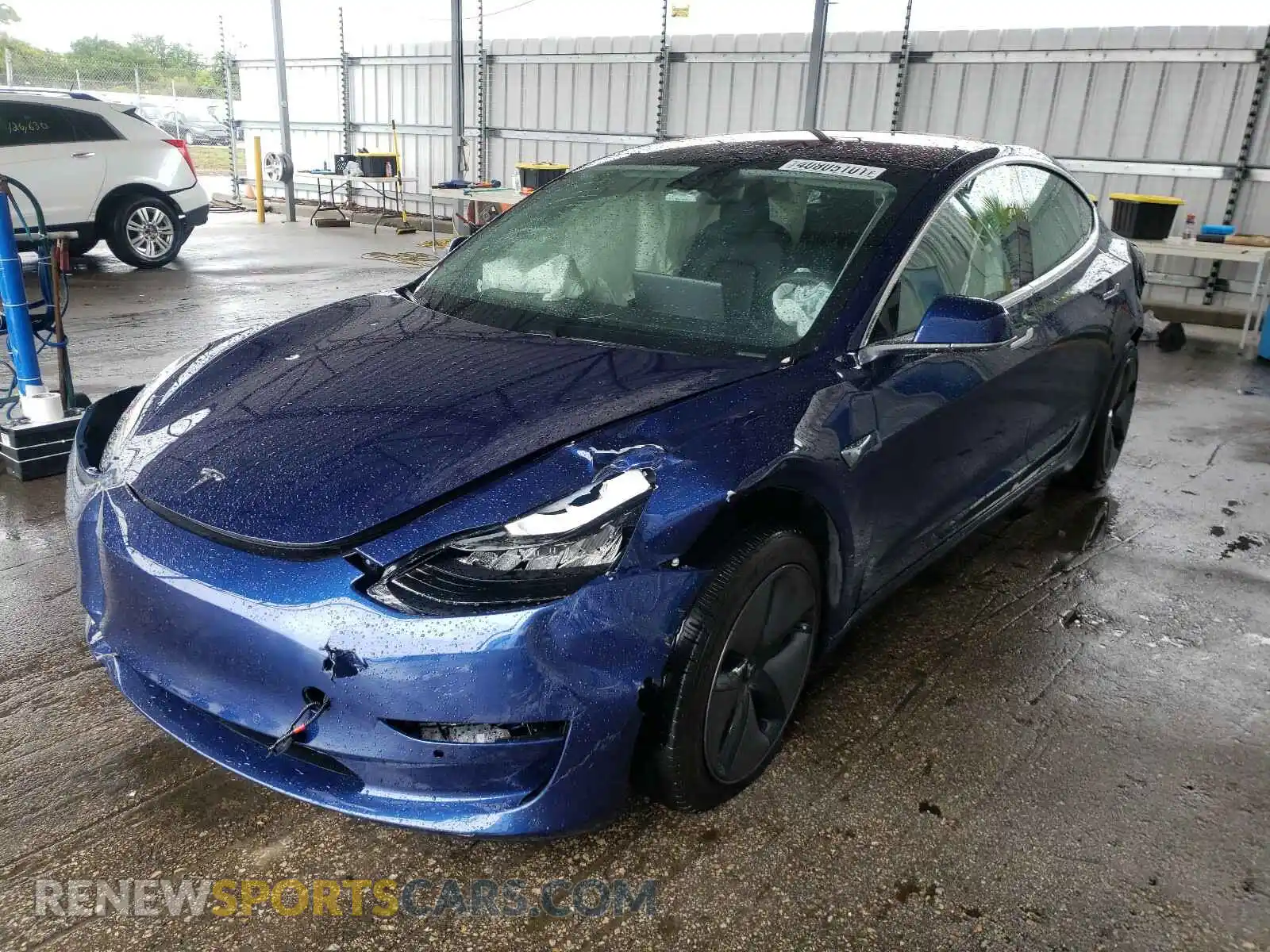 2 fotografías del automóvil dañado 5YJ3E1EA0KF299435 TESLA MODEL 3 2019