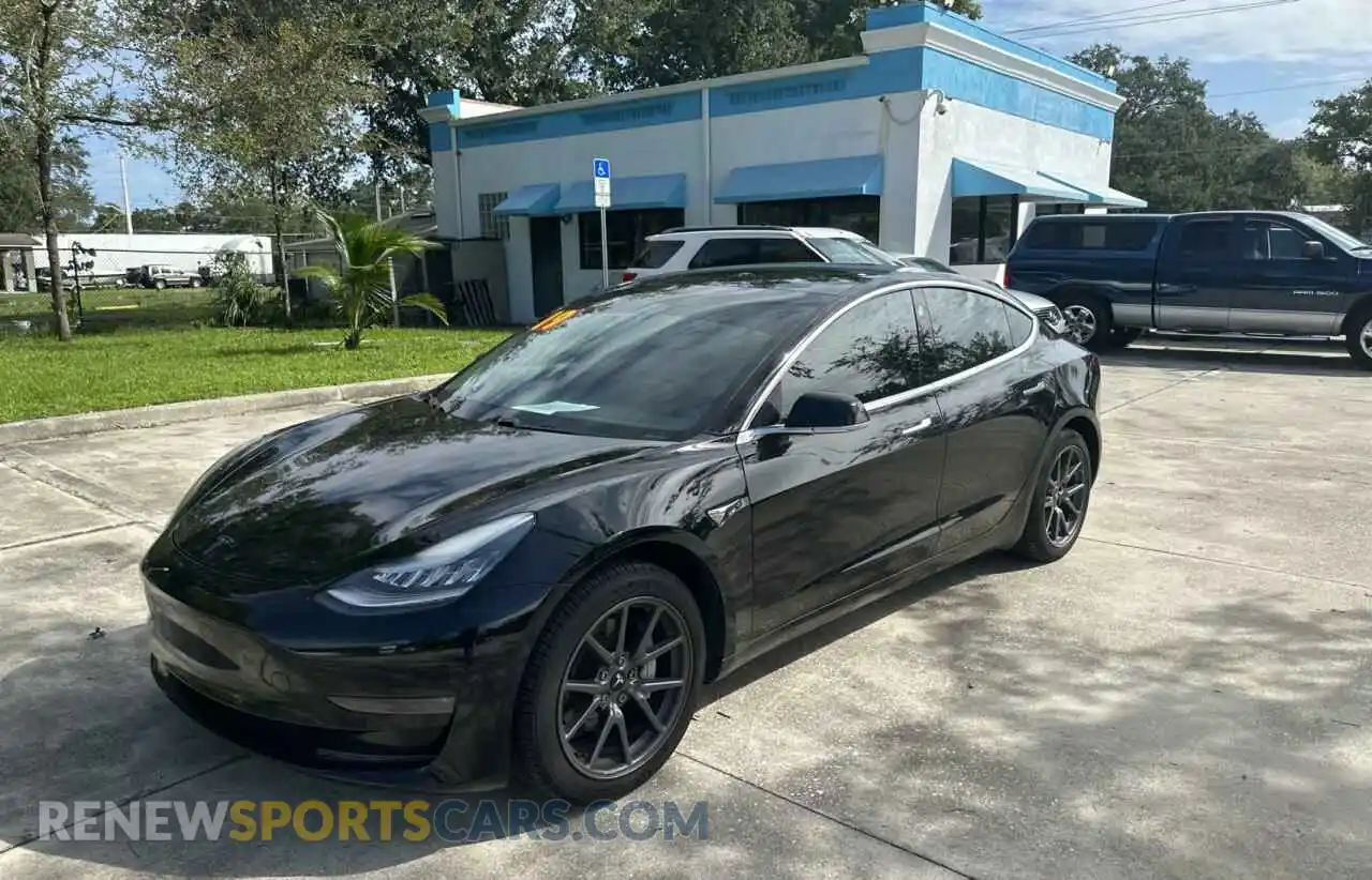 2 fotografías del automóvil dañado 5YJ3E1EA2KF399391 TESLA MODEL 3 2019