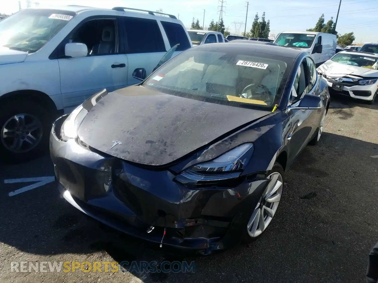 2 Photograph of a damaged car 5YJ3E1EA2KF543036 TESLA MODEL 3 2019