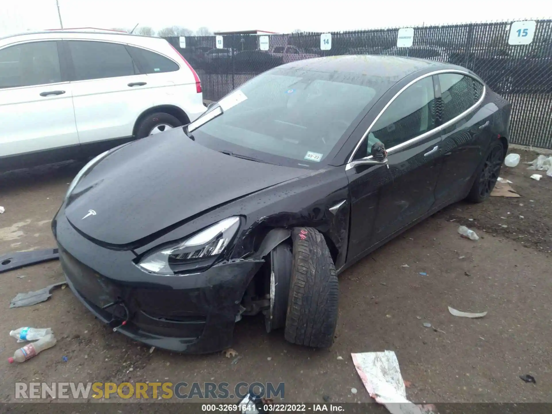 2 fotografías del automóvil dañado 5YJ3E1EA3KF324991 TESLA MODEL 3 2019