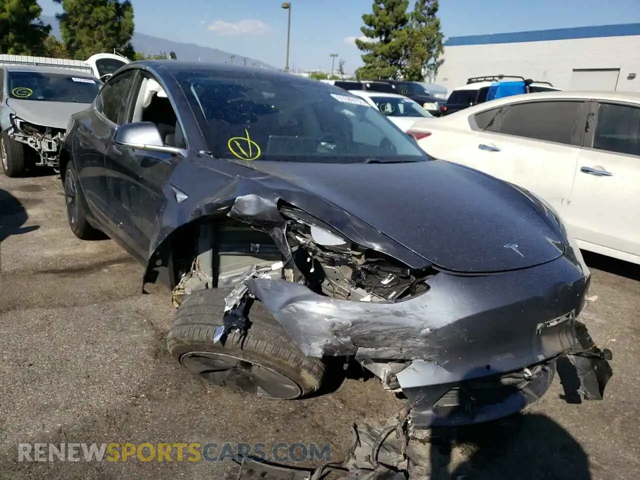 1 Photograph of a damaged car 5YJ3E1EA4KF411086 TESLA MODEL 3 2019