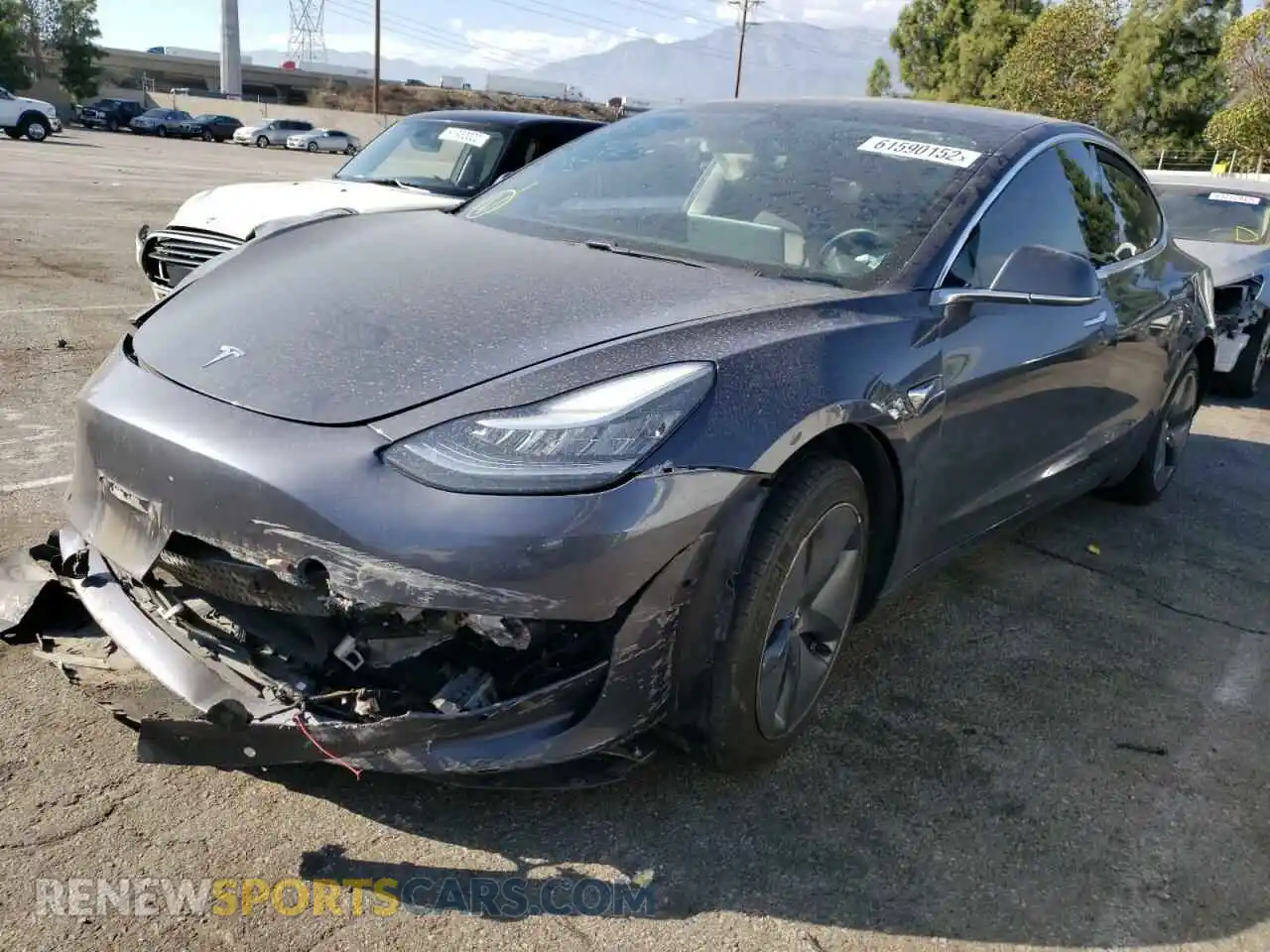 2 Photograph of a damaged car 5YJ3E1EA4KF411086 TESLA MODEL 3 2019