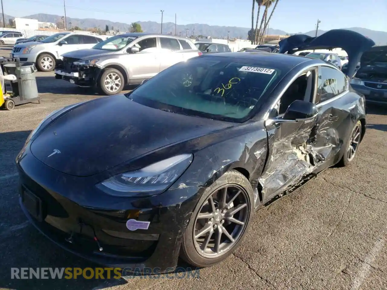 2 Photograph of a damaged car 5YJ3E1EA8KF410099 TESLA MODEL 3 2019