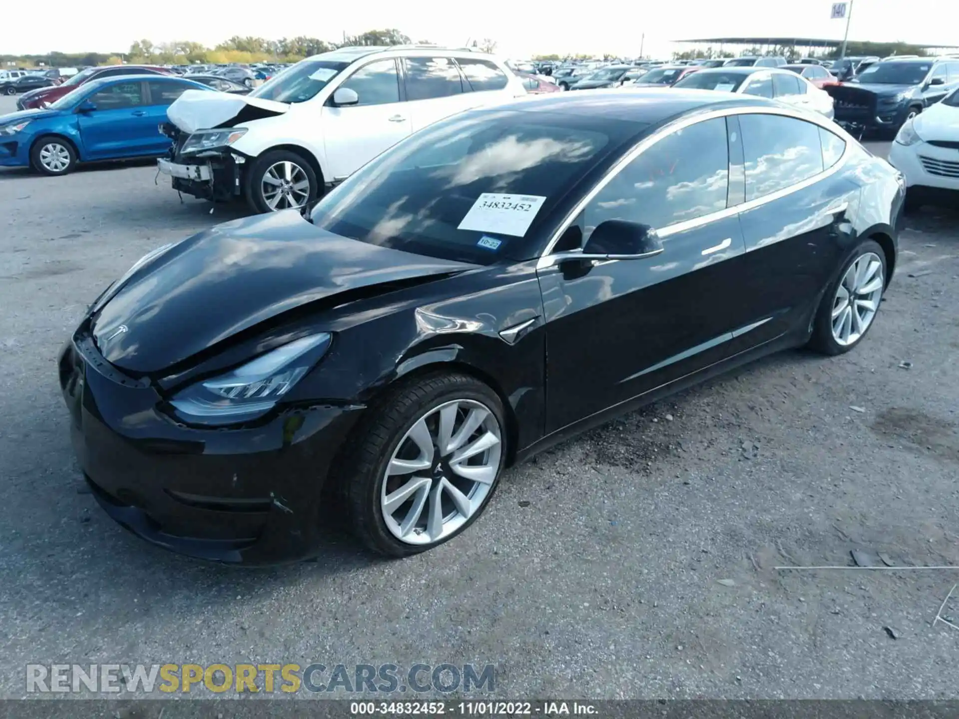 2 fotografías del automóvil dañado 5YJ3E1EA9KF300324 TESLA MODEL 3 2019