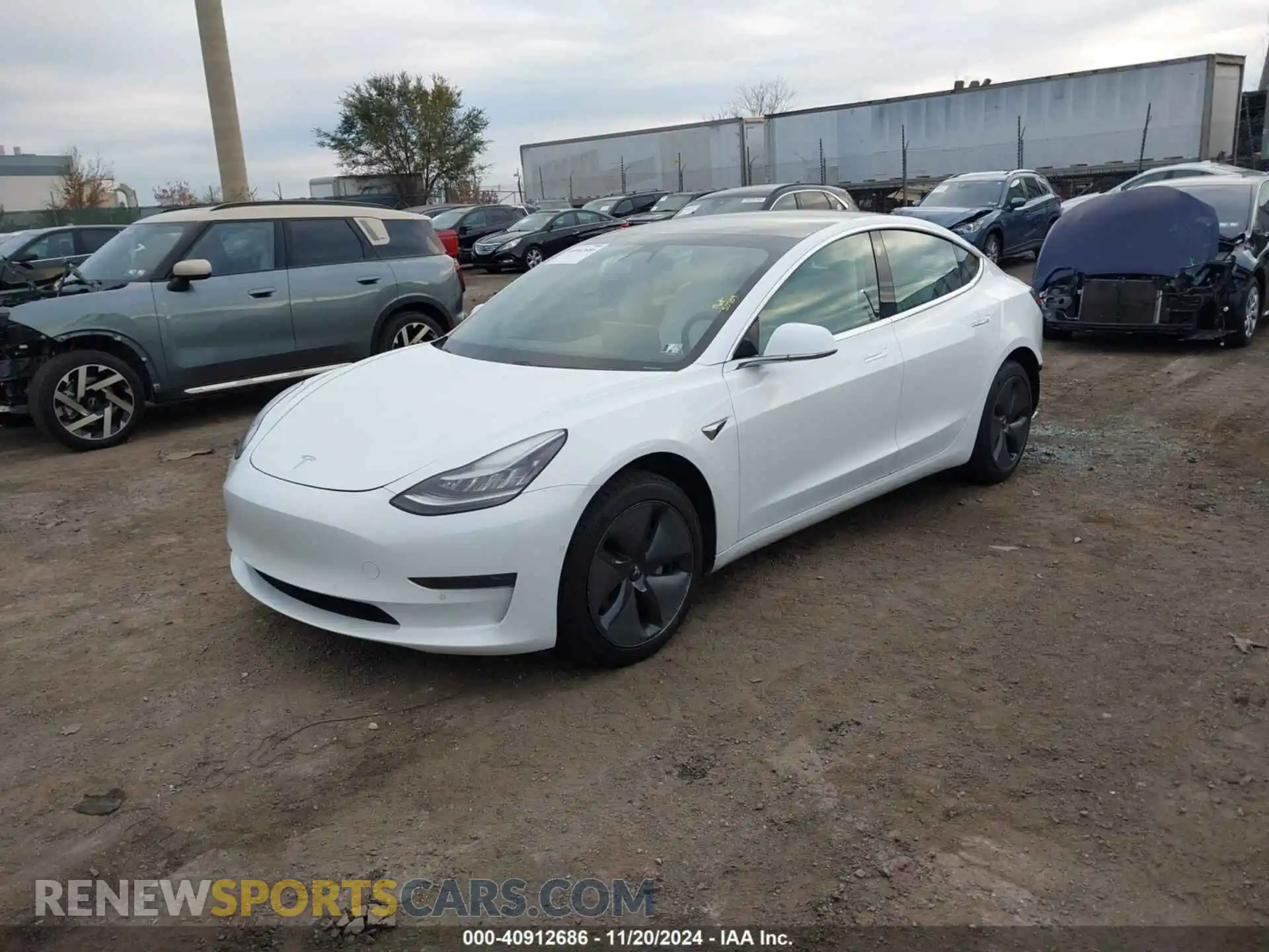 2 Photograph of a damaged car 5YJ3E1EAXKF486455 TESLA MODEL 3 2019