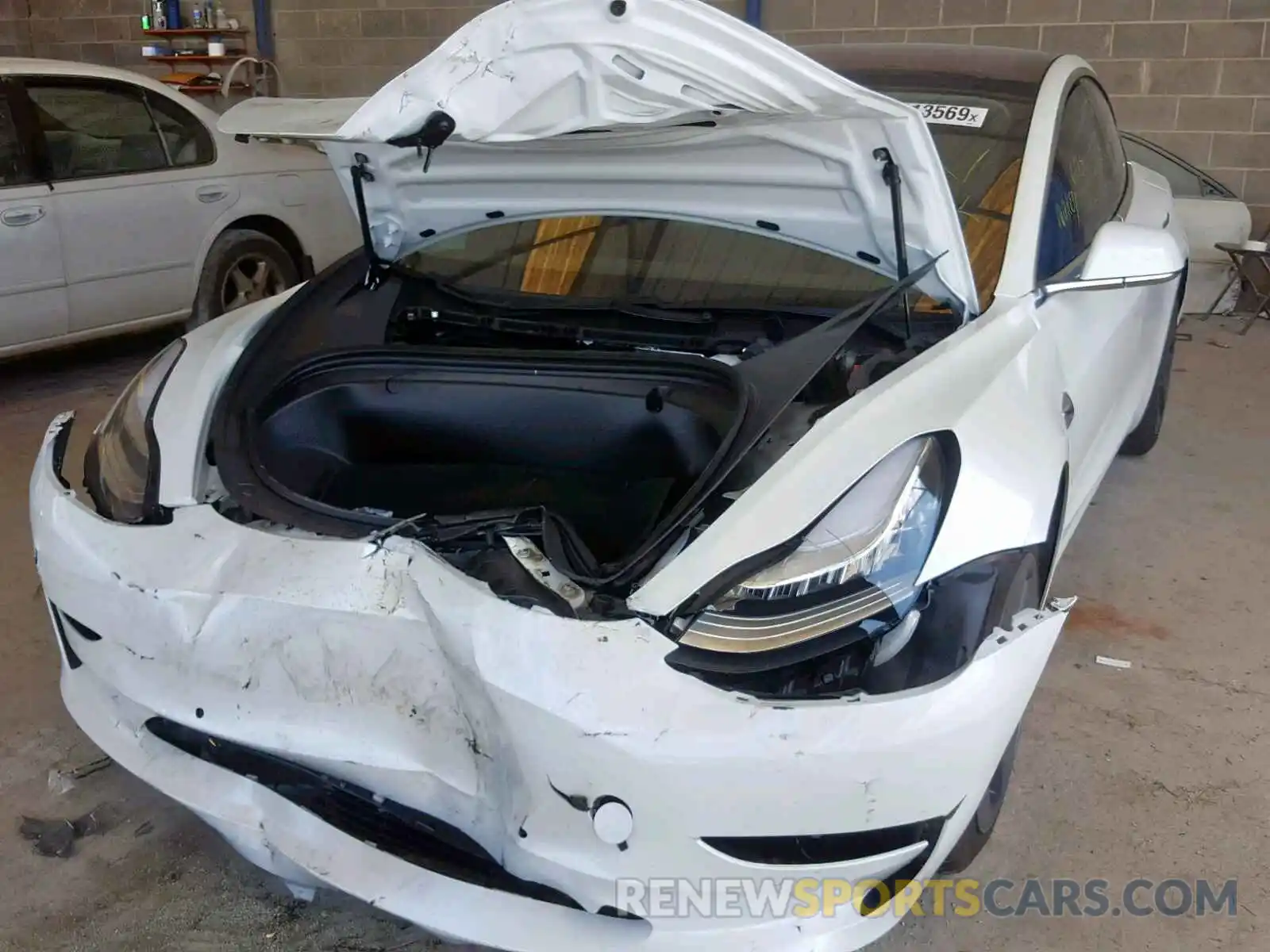 9 Photograph of a damaged car 5YJ3E1EB0KF193799 TESLA MODEL 3 2019