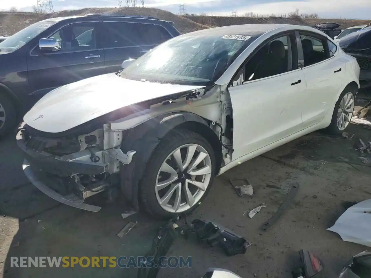 1 Photograph of a damaged car 5YJ3E1EB0KF390214 TESLA MODEL 3 2019