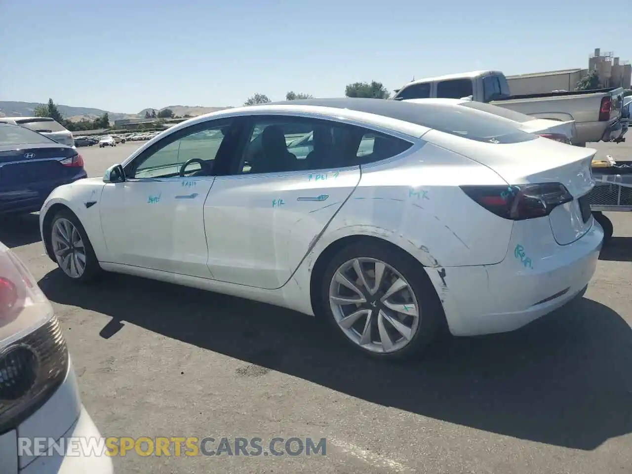 2 fotografías del automóvil dañado 5YJ3E1EB1KF192046 TESLA MODEL 3 2019