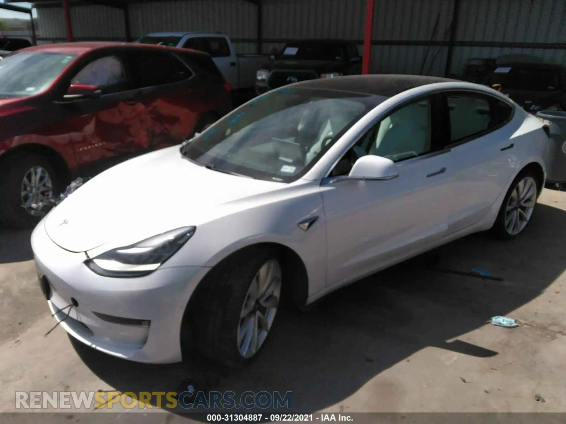 2 fotografías del automóvil dañado 5YJ3E1EB1KF487499 TESLA MODEL 3 2019