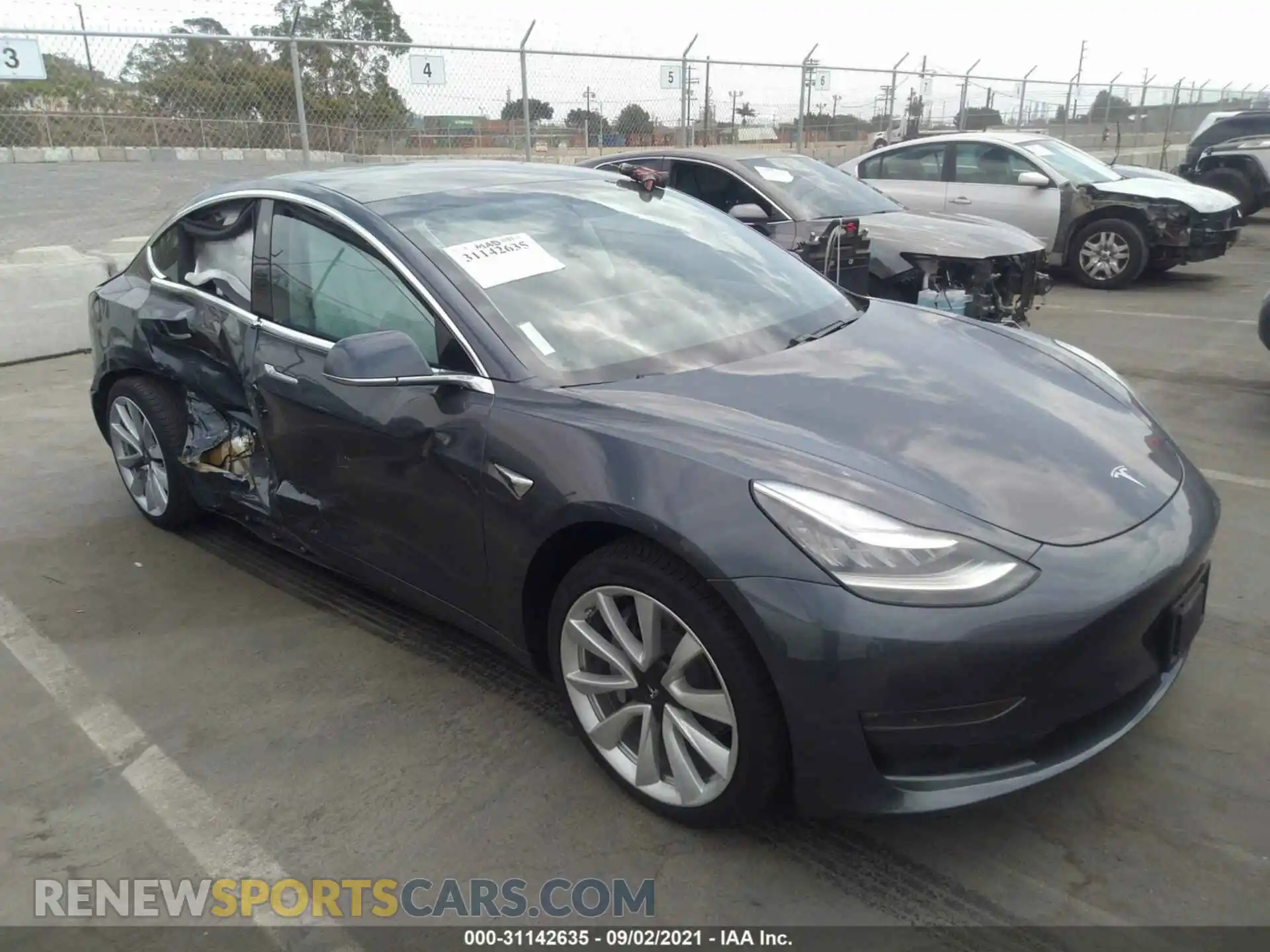 1 Photograph of a damaged car 5YJ3E1EB1KF529928 TESLA MODEL 3 2019