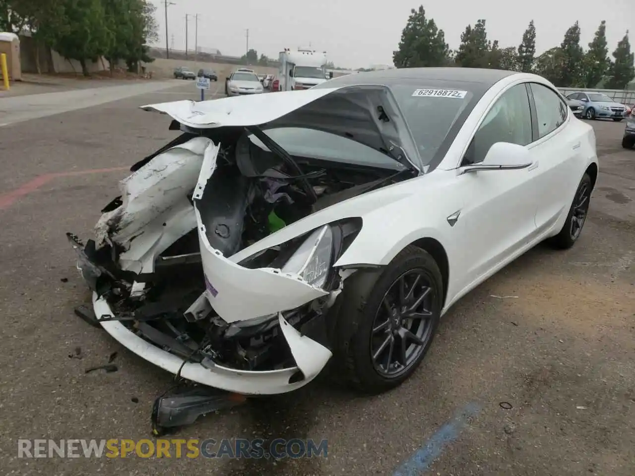2 Photograph of a damaged car 5YJ3E1EB2KF359594 TESLA MODEL 3 2019