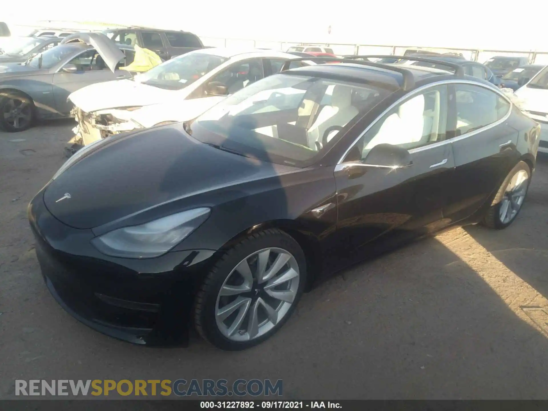 2 Photograph of a damaged car 5YJ3E1EB4KF421416 TESLA MODEL 3 2019