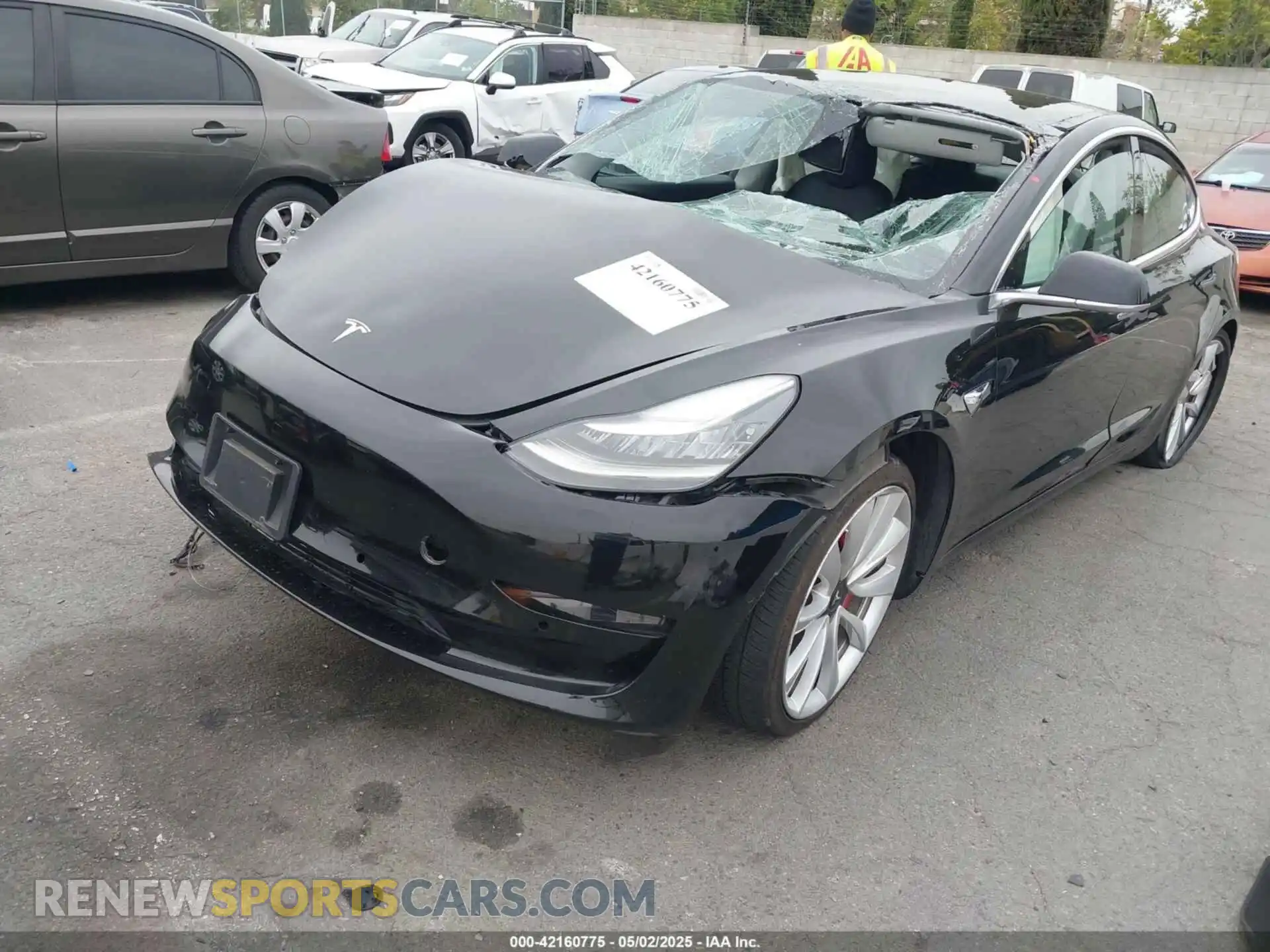2 fotografías del automóvil dañado 5YJ3E1EB5KF434613 TESLA MODEL 3 2019