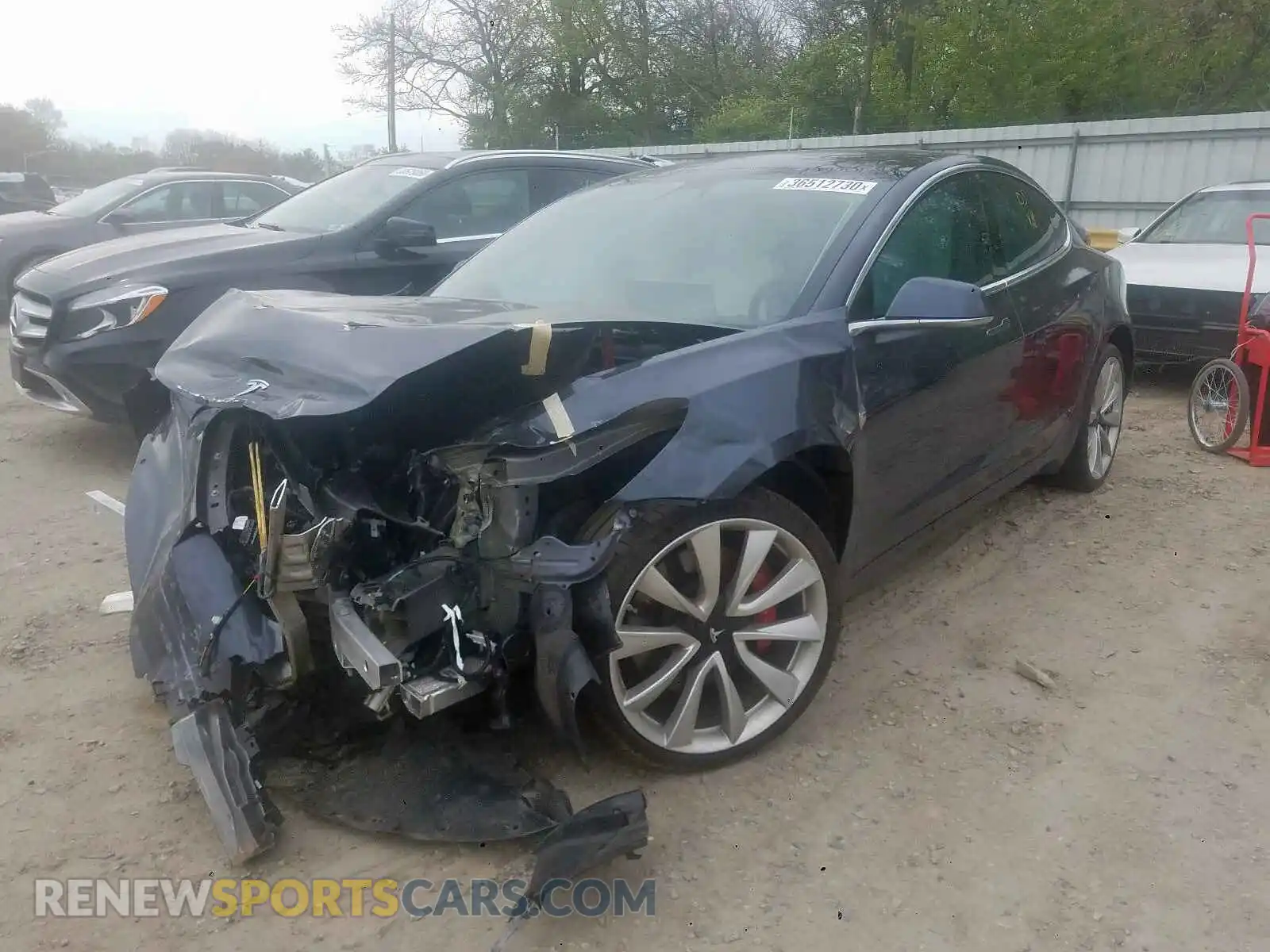2 Photograph of a damaged car 5YJ3E1EB7KF393398 TESLA MODEL 3 2019