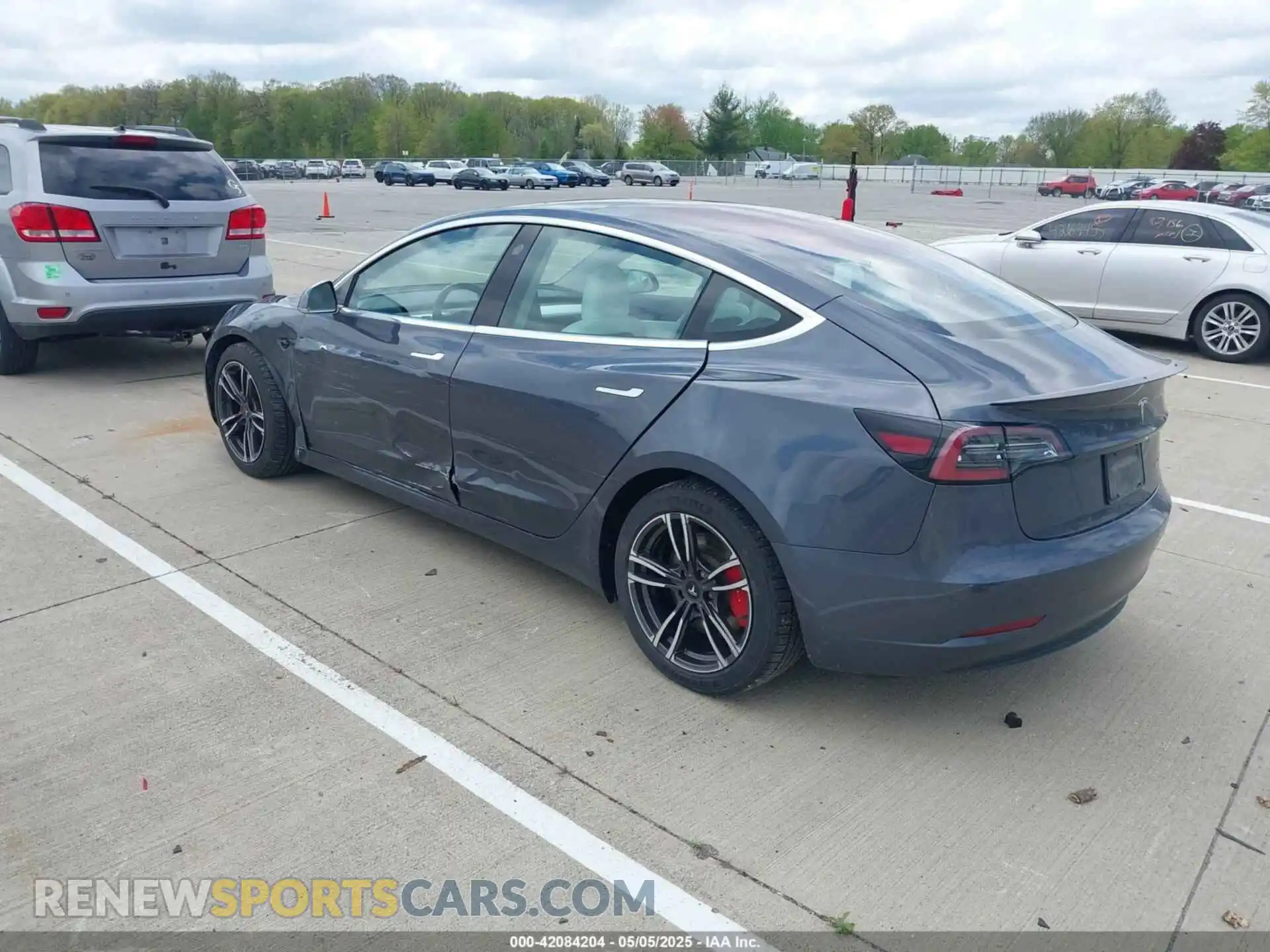 3 Photograph of a damaged car 5YJ3E1EB9KF230493 TESLA MODEL 3 2019