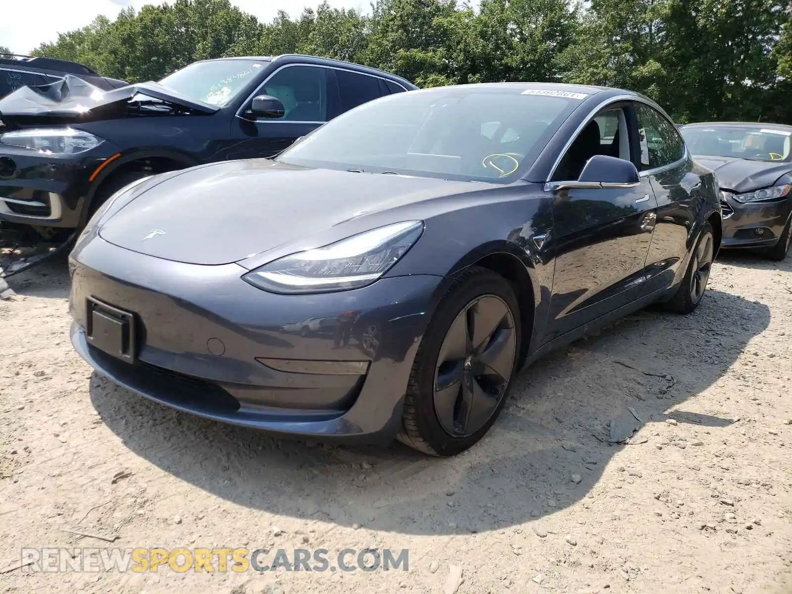 2 fotografías del automóvil dañado 5YJ3E1EB9KF386095 TESLA MODEL 3 2019
