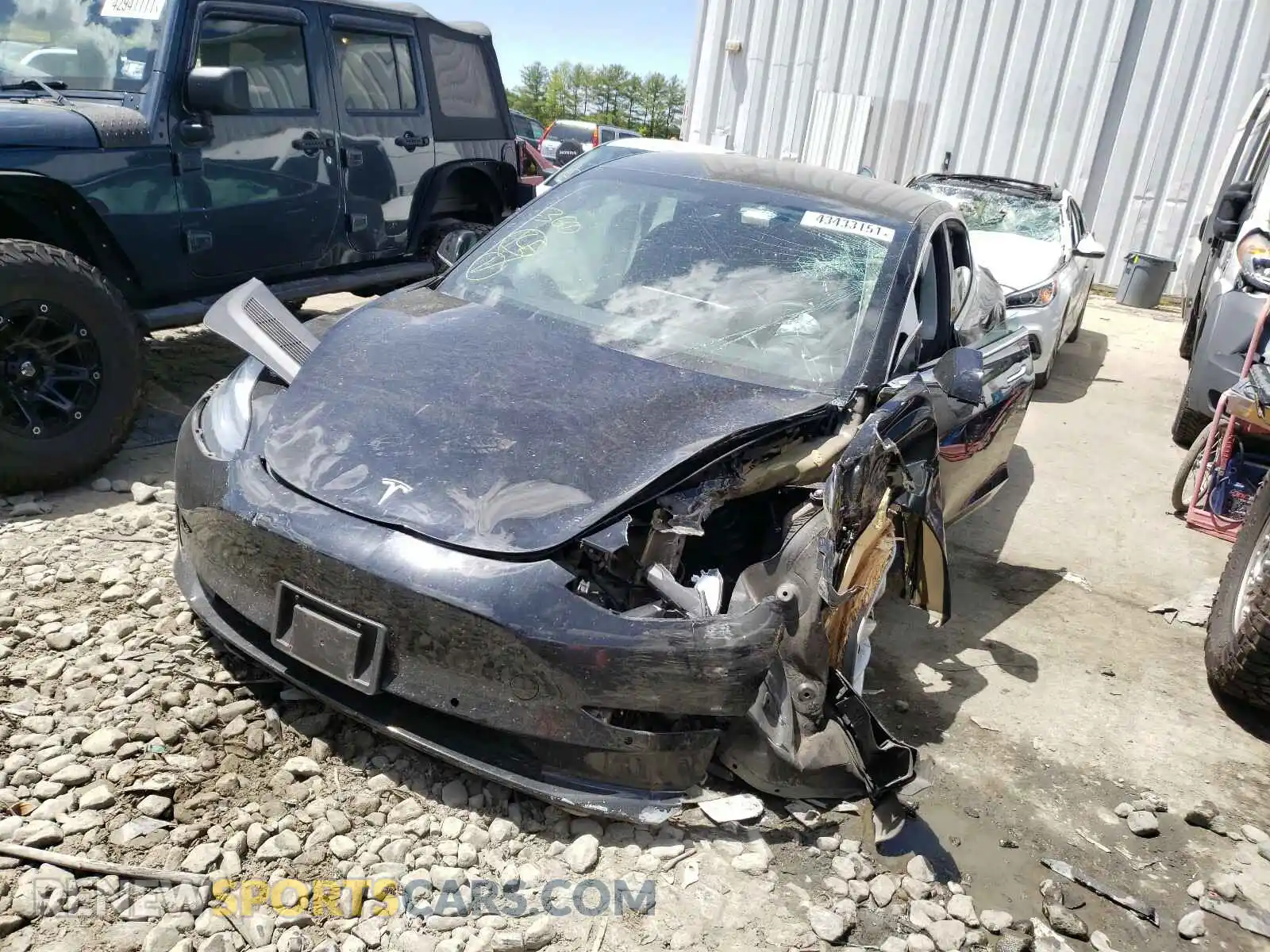 2 Photograph of a damaged car 5YJ3E1EB9KF389000 TESLA MODEL 3 2019