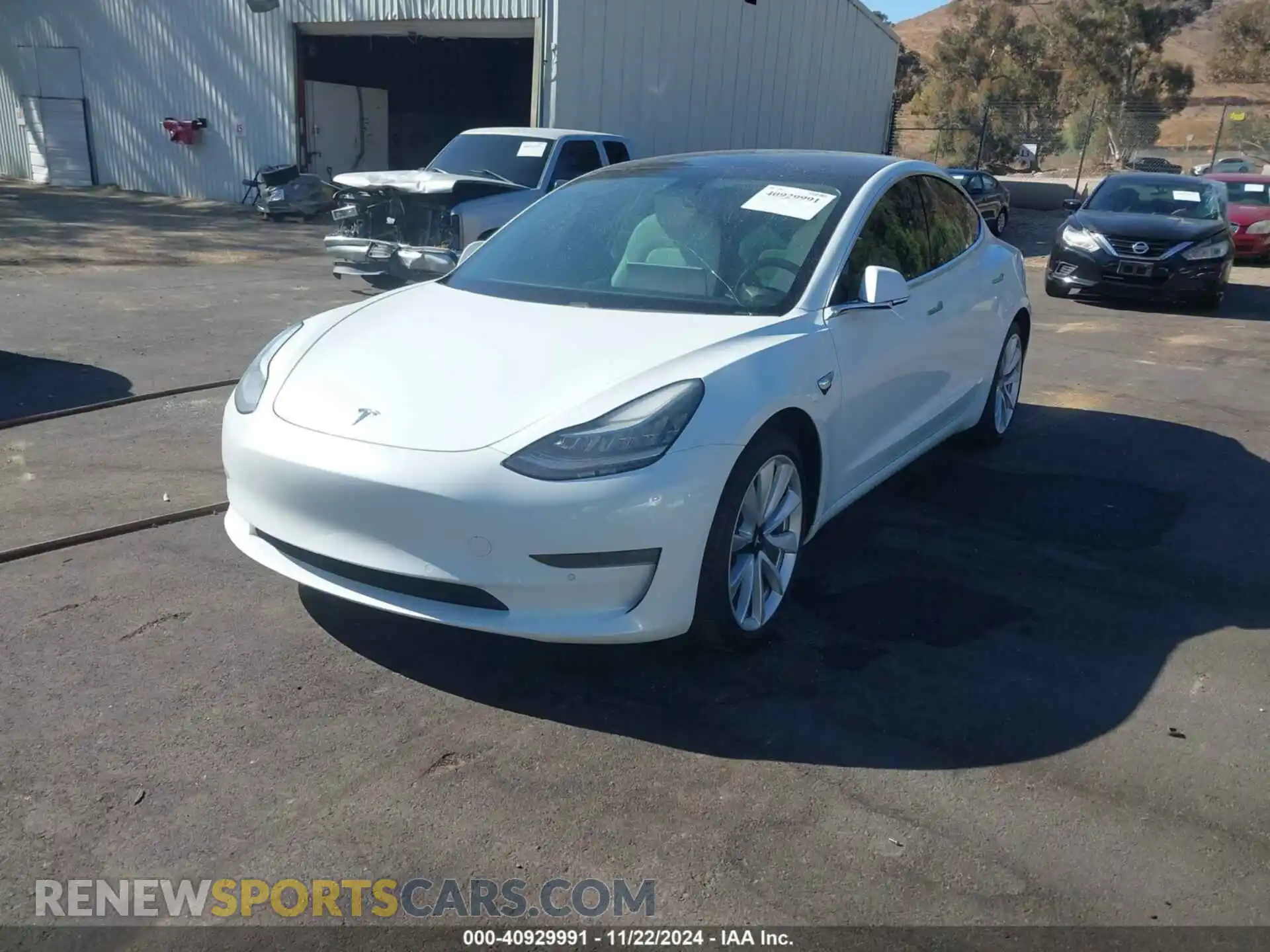 2 Photograph of a damaged car 5YJ3E1EB9KF406992 TESLA MODEL 3 2019