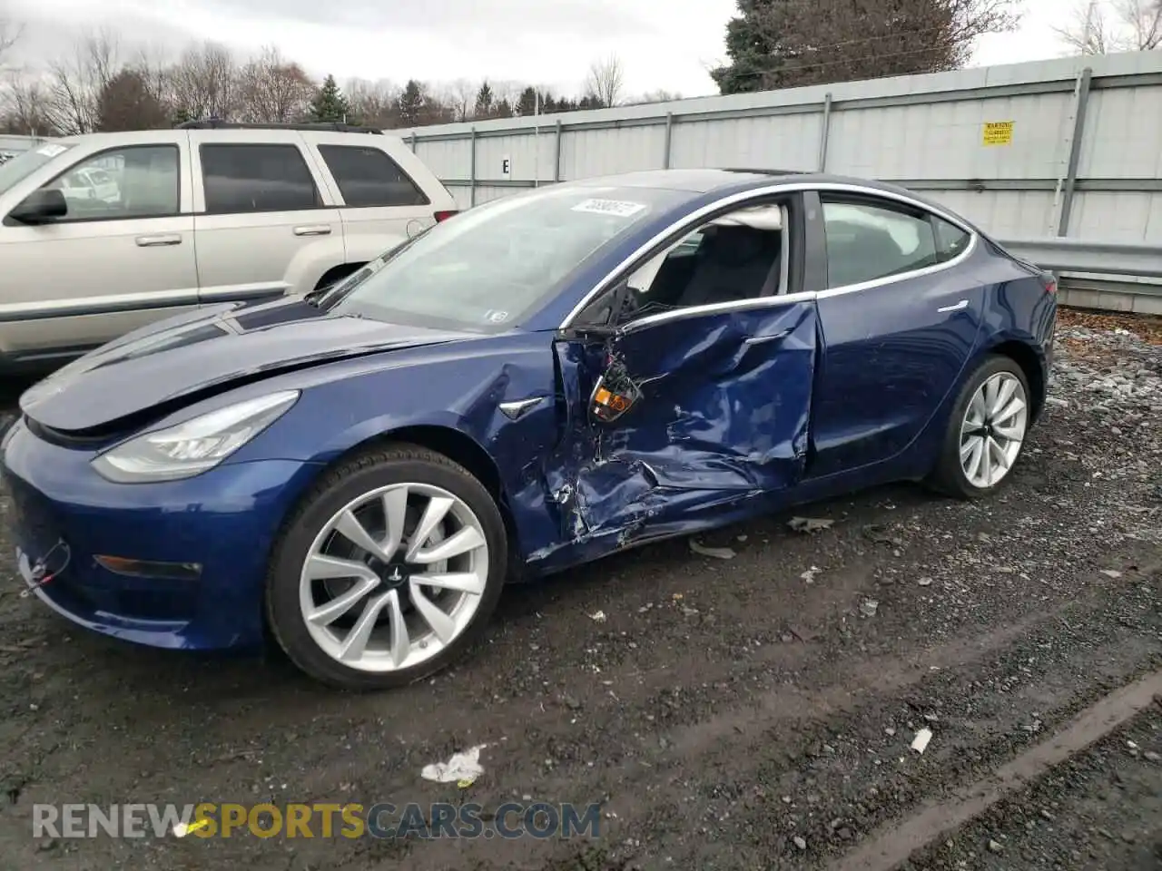 1 Photograph of a damaged car 5YJ3E1EBXKF389877 TESLA MODEL 3 2019