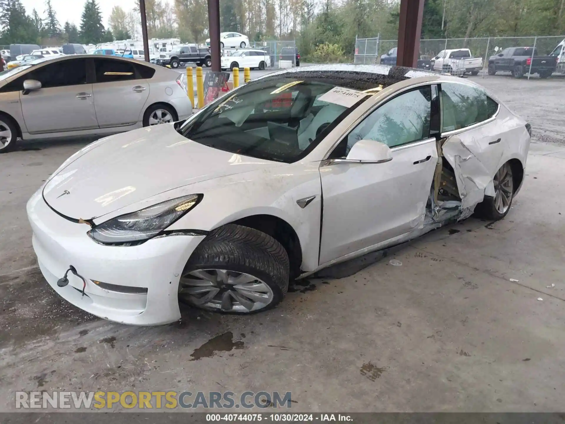2 fotografías del automóvil dañado 5YJ3E1EBXKF392519 TESLA MODEL 3 2019