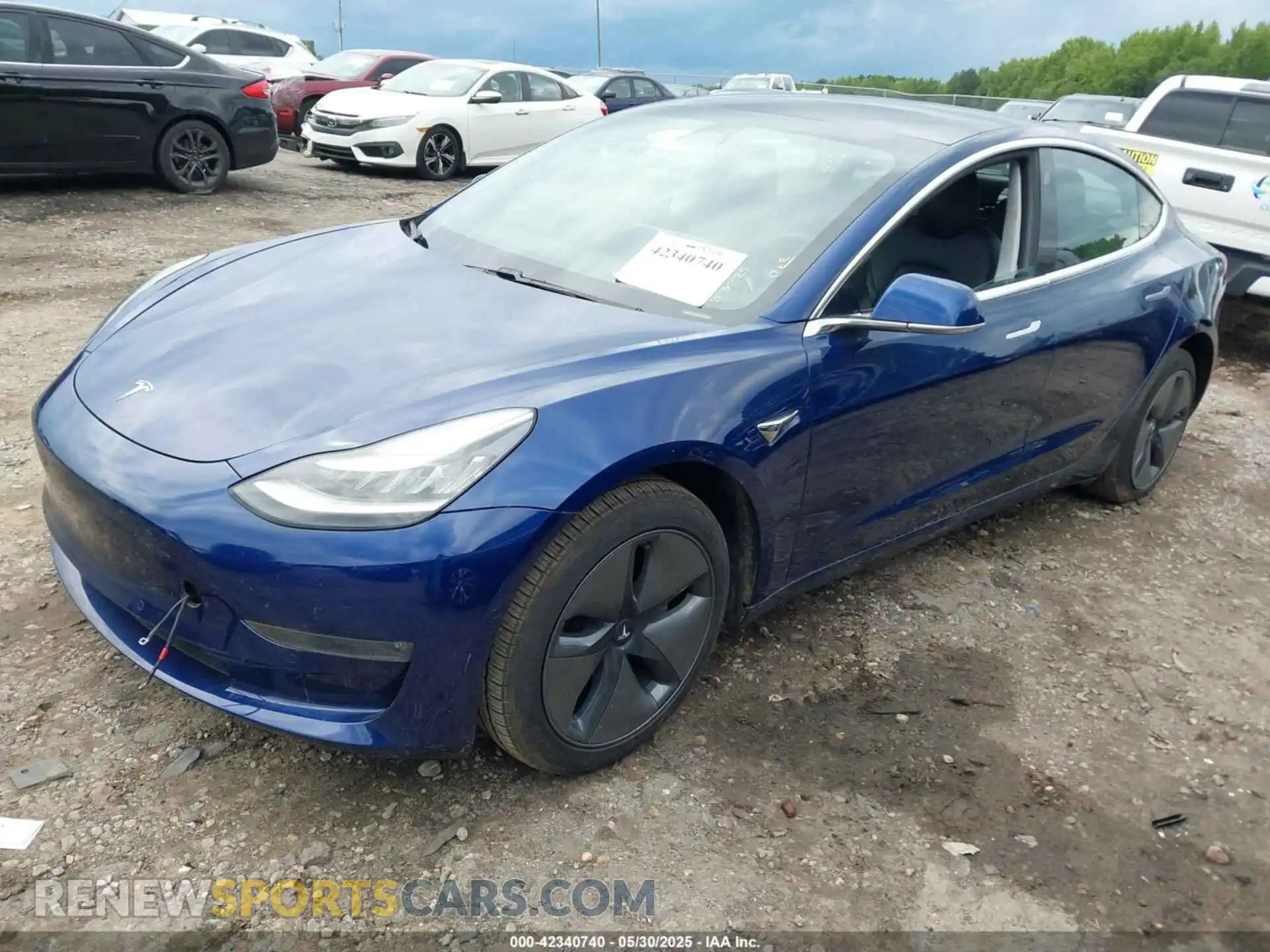 2 fotografías del automóvil dañado 5YJ3E1EBXKF393900 TESLA MODEL 3 2019