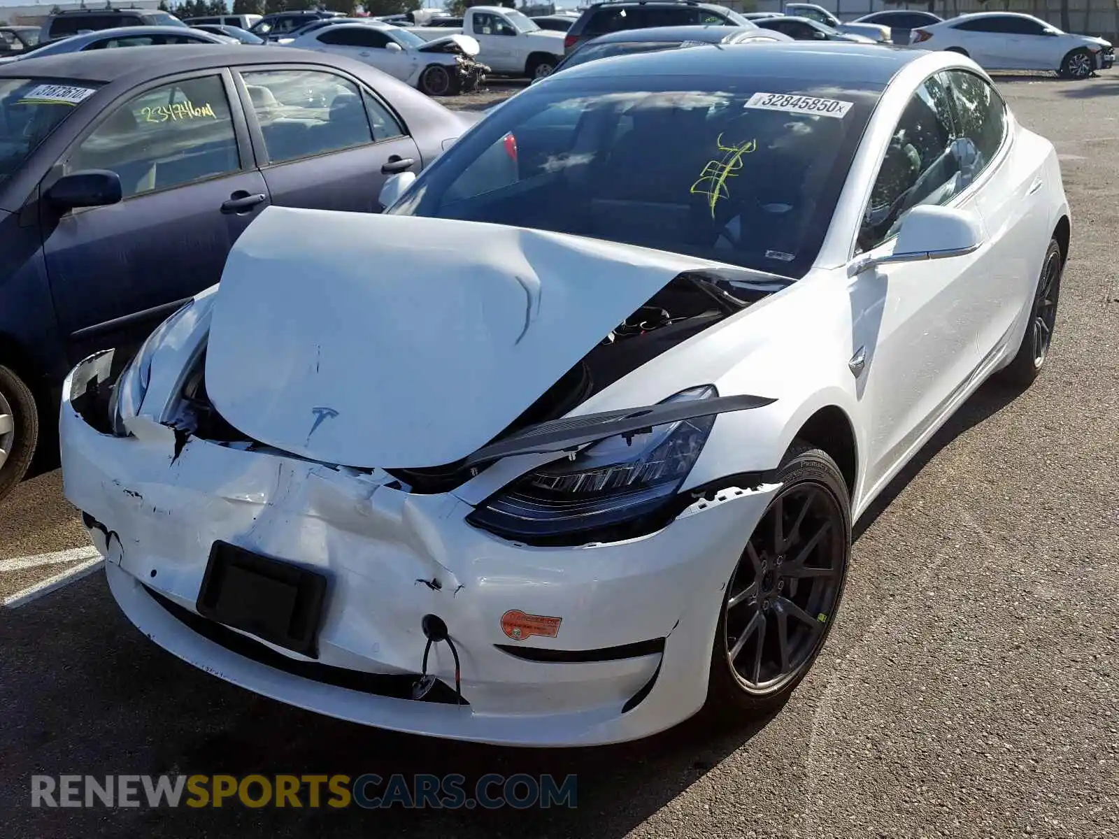 2 Photograph of a damaged car 5YJ3E1EA0LF613795 TESLA MODEL 3 2020
