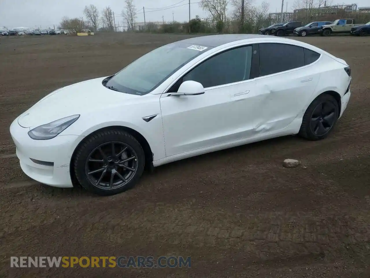 1 Photograph of a damaged car 5YJ3E1EA0LF715713 TESLA MODEL 3 2020