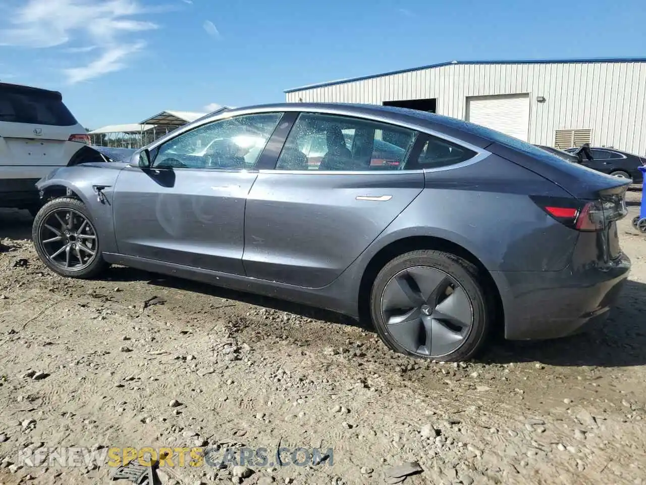 2 Photograph of a damaged car 5YJ3E1EA1LF659748 TESLA MODEL 3 2020