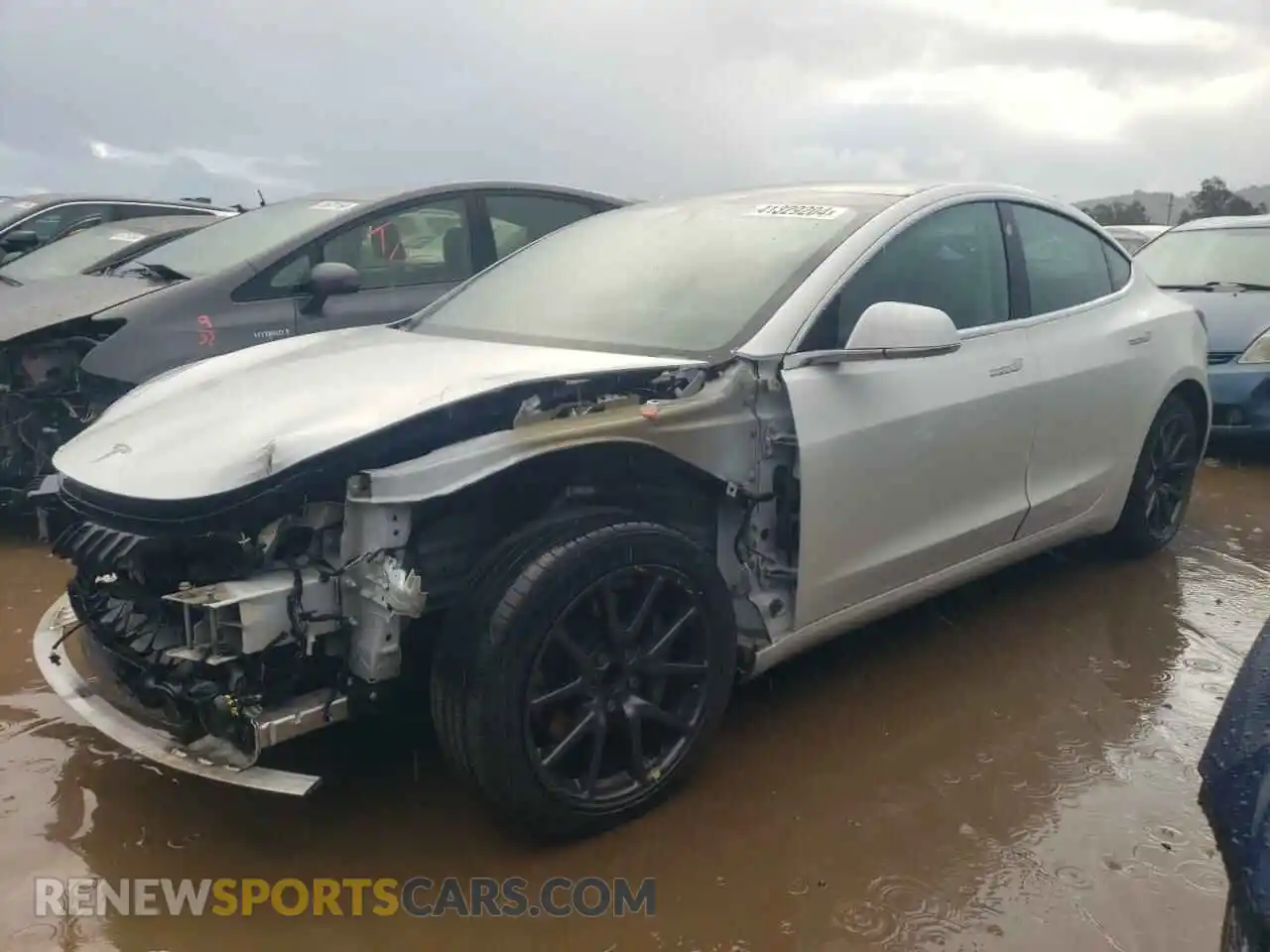 1 Photograph of a damaged car 5YJ3E1EA2LF612695 TESLA MODEL 3 2020