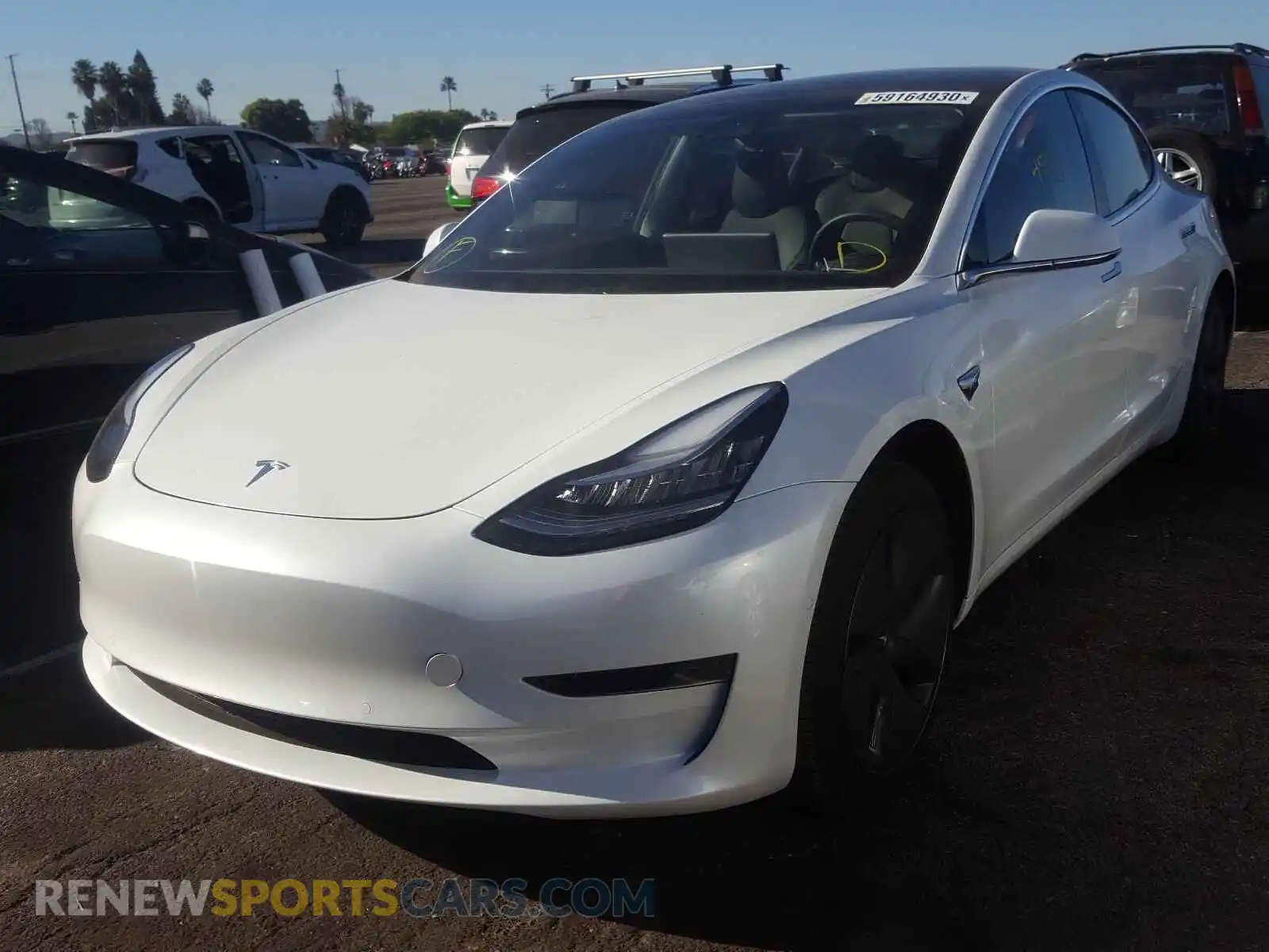 2 Photograph of a damaged car 5YJ3E1EA2LF631358 TESLA MODEL 3 2020