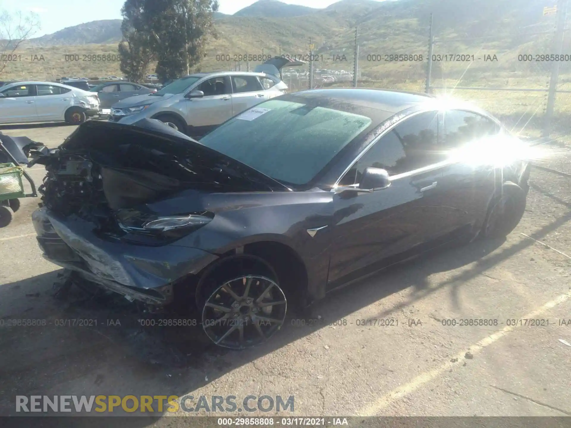 2 fotografías del automóvil dañado 5YJ3E1EA2LF644076 TESLA MODEL 3 2020