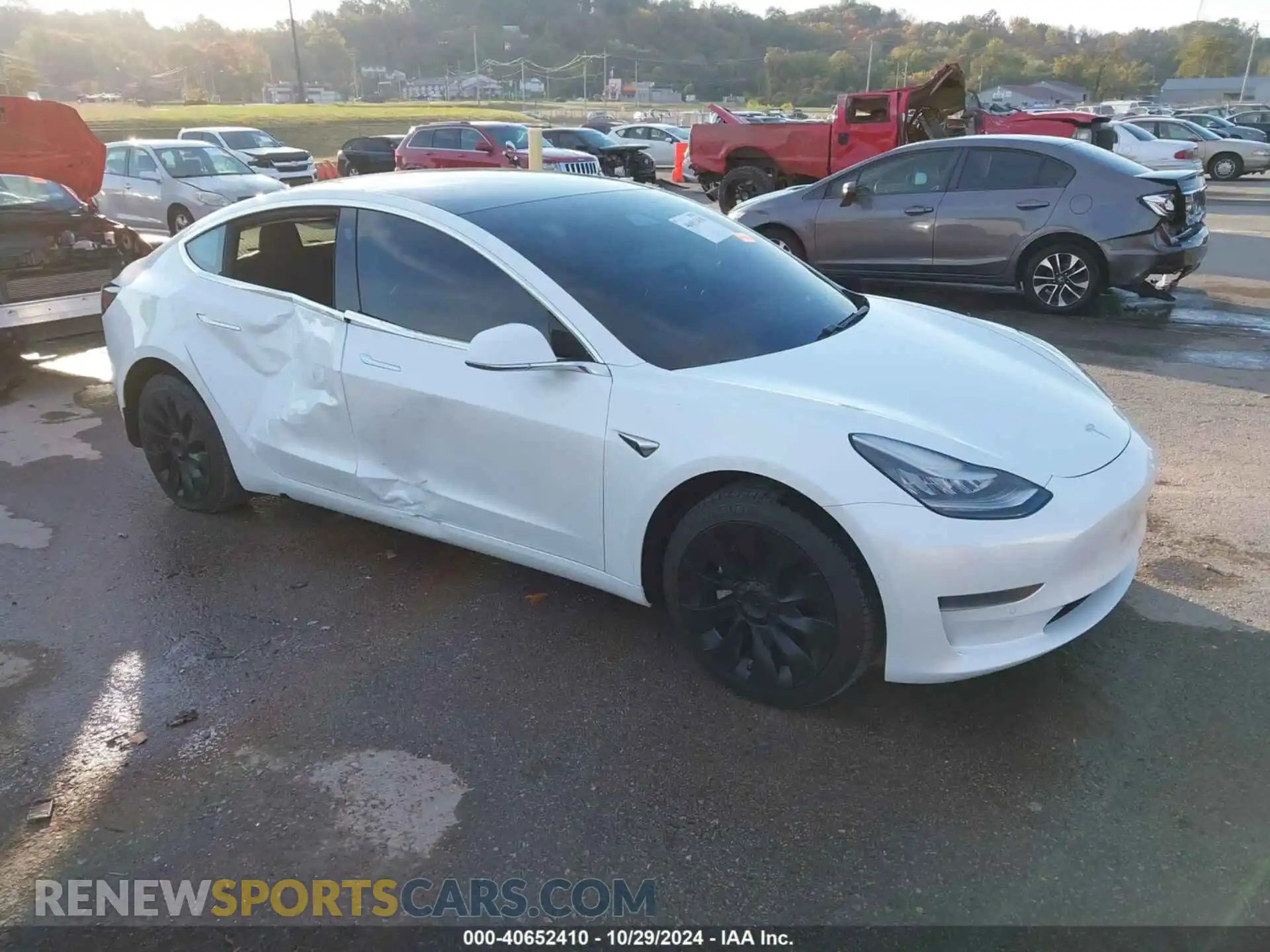 1 Photograph of a damaged car 5YJ3E1EA2LF659872 TESLA MODEL 3 2020