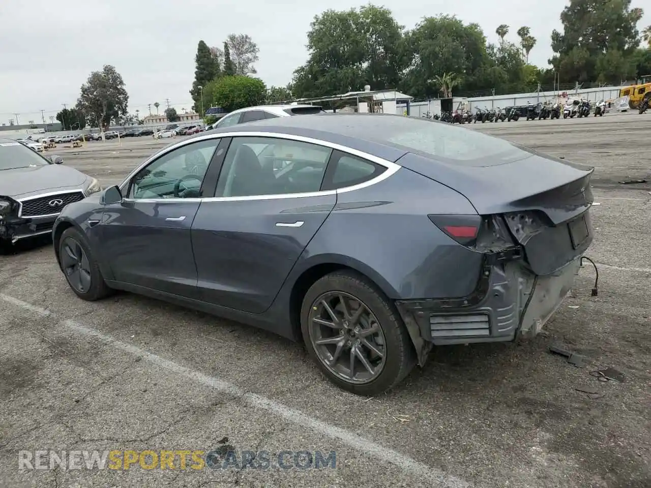 2 Photograph of a damaged car 5YJ3E1EA2LF704941 TESLA MODEL 3 2020
