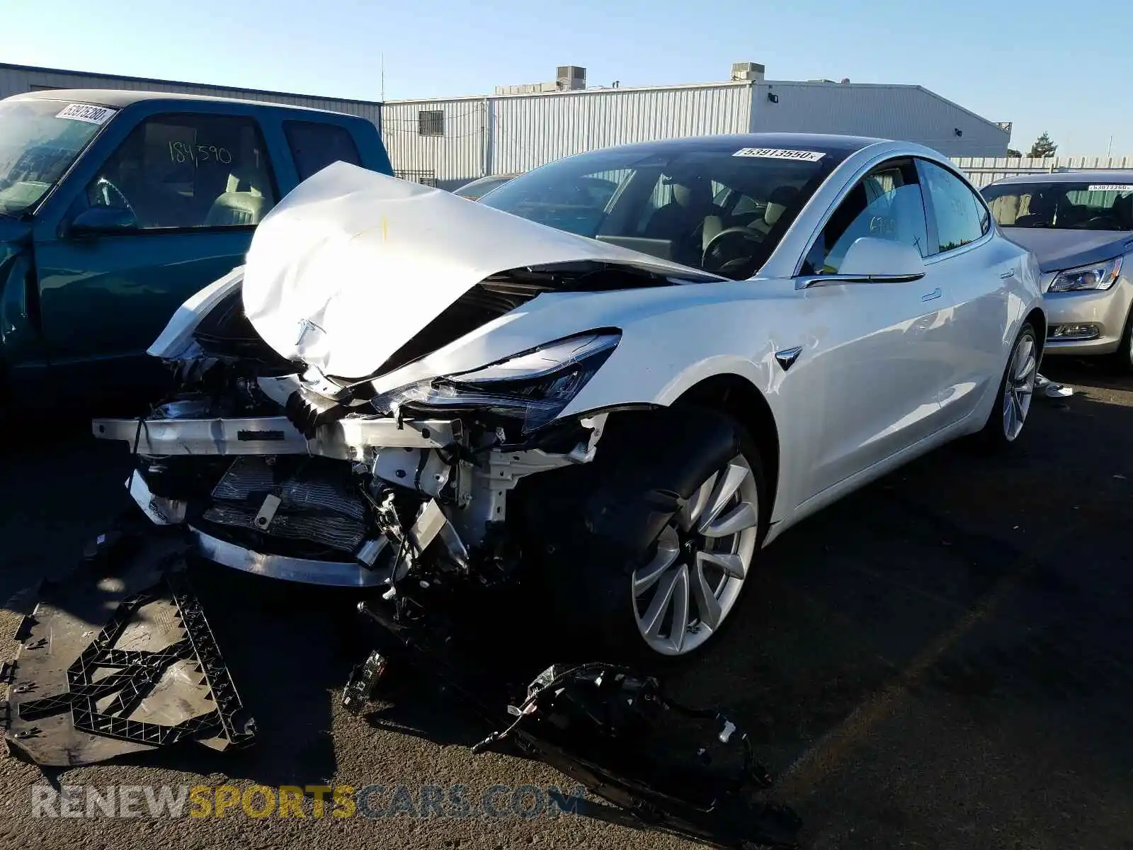 2 Photograph of a damaged car 5YJ3E1EA2LF709007 TESLA MODEL 3 2020