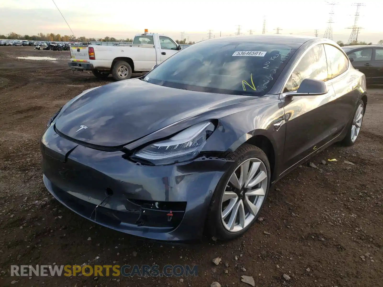 2 fotografías del automóvil dañado 5YJ3E1EA4LF792956 TESLA MODEL 3 2020