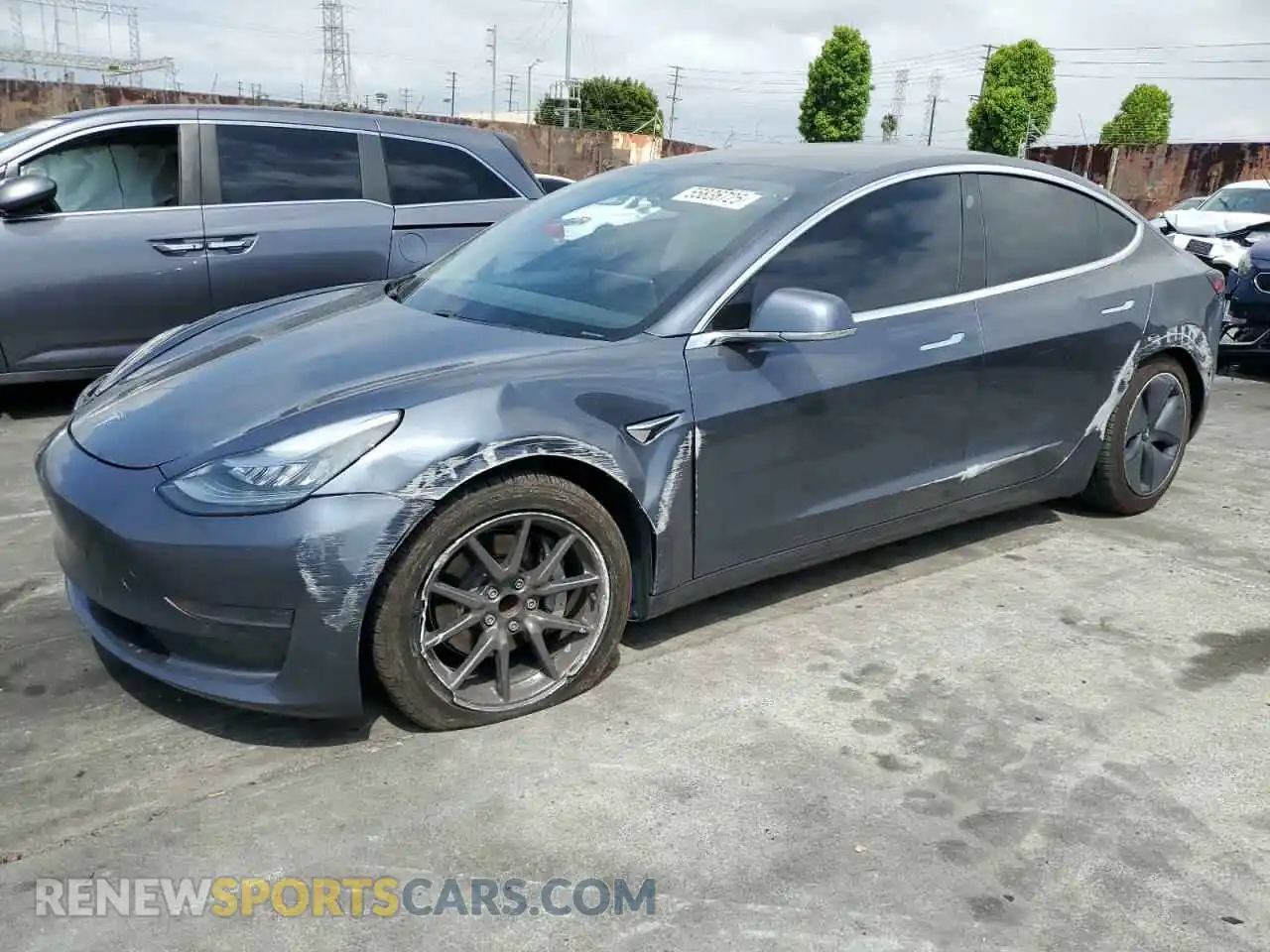 1 Photograph of a damaged car 5YJ3E1EA5LF704996 TESLA MODEL 3 2020