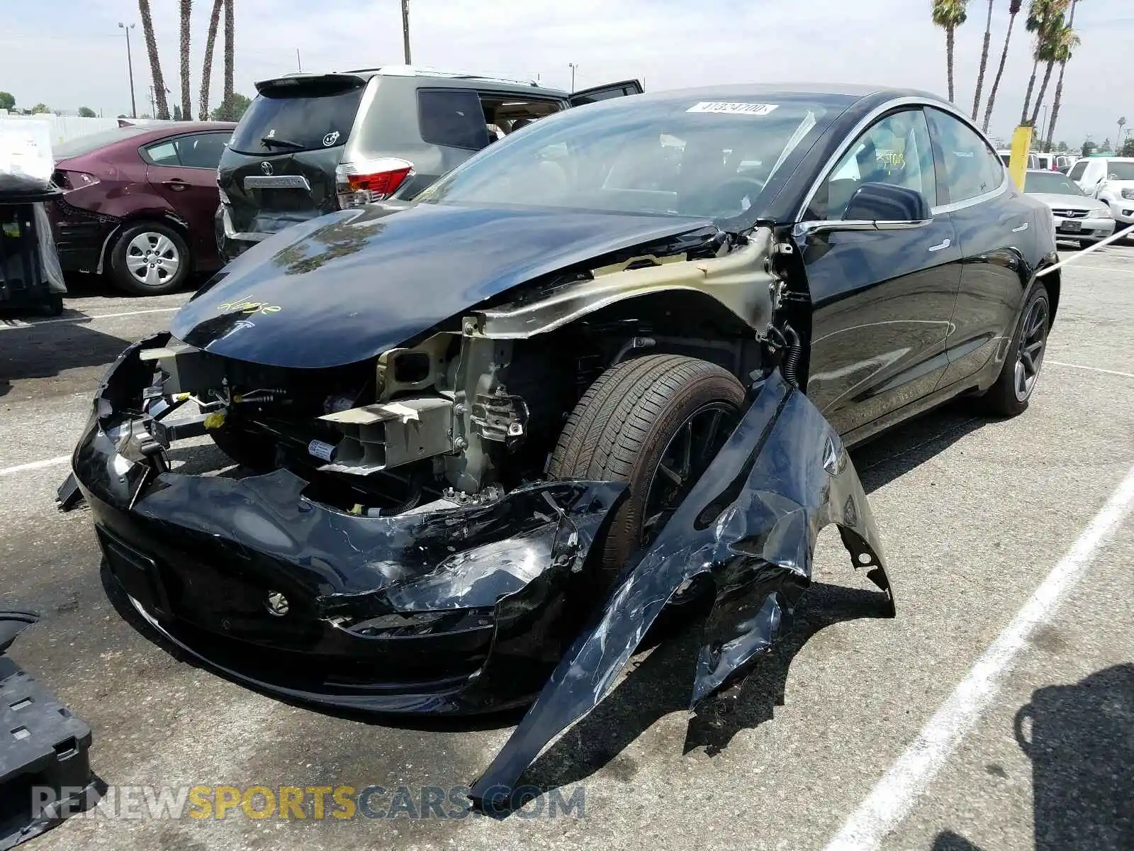 2 Photograph of a damaged car 5YJ3E1EA6LF630066 TESLA MODEL 3 2020